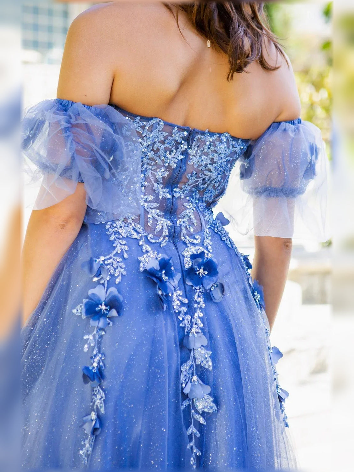 Blue off-the-shoulder formal dress with floral applique embroidery on fitted bodice