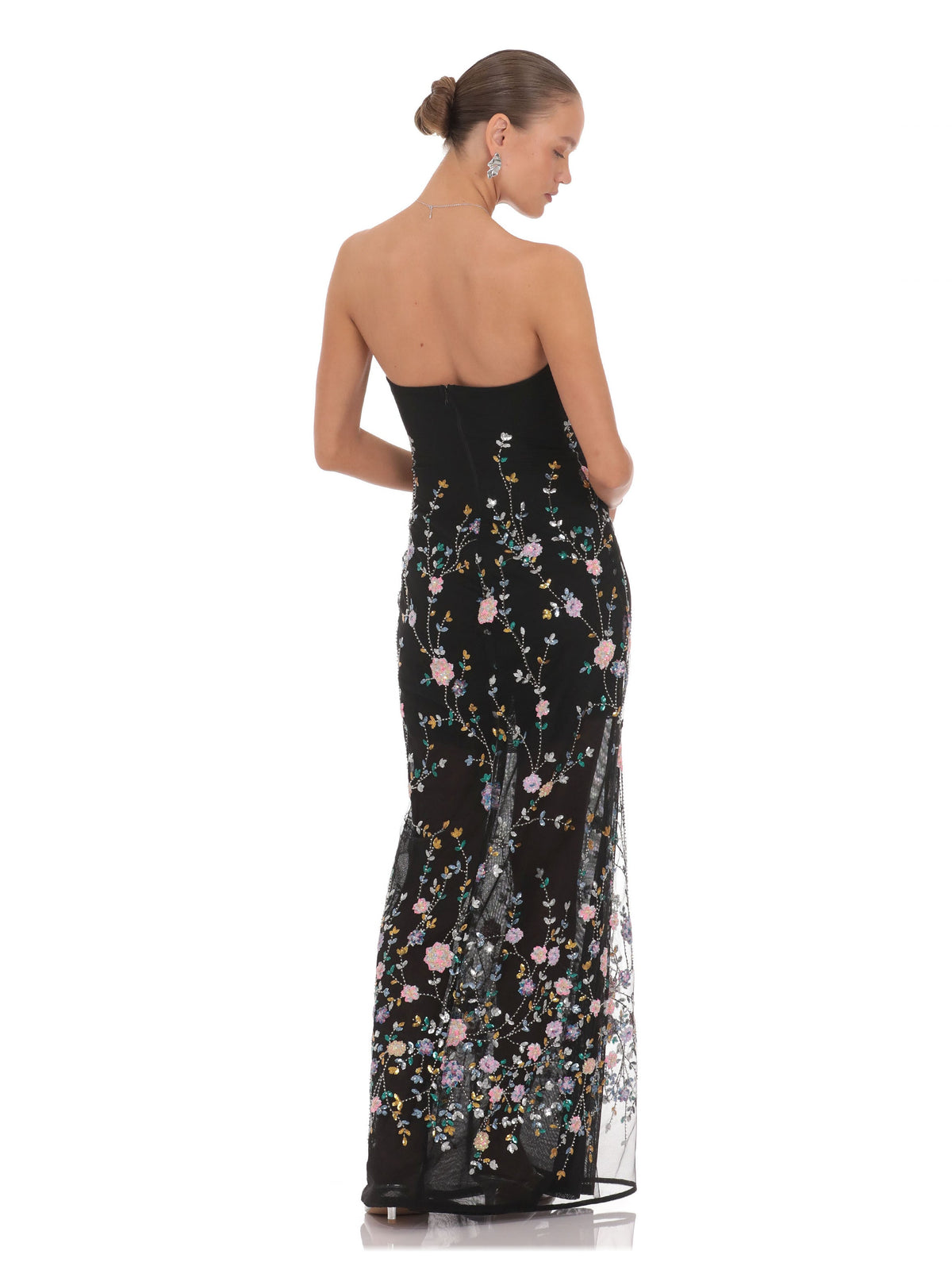Black bridesmaid dress with structured woven fabric construction and maxi hem