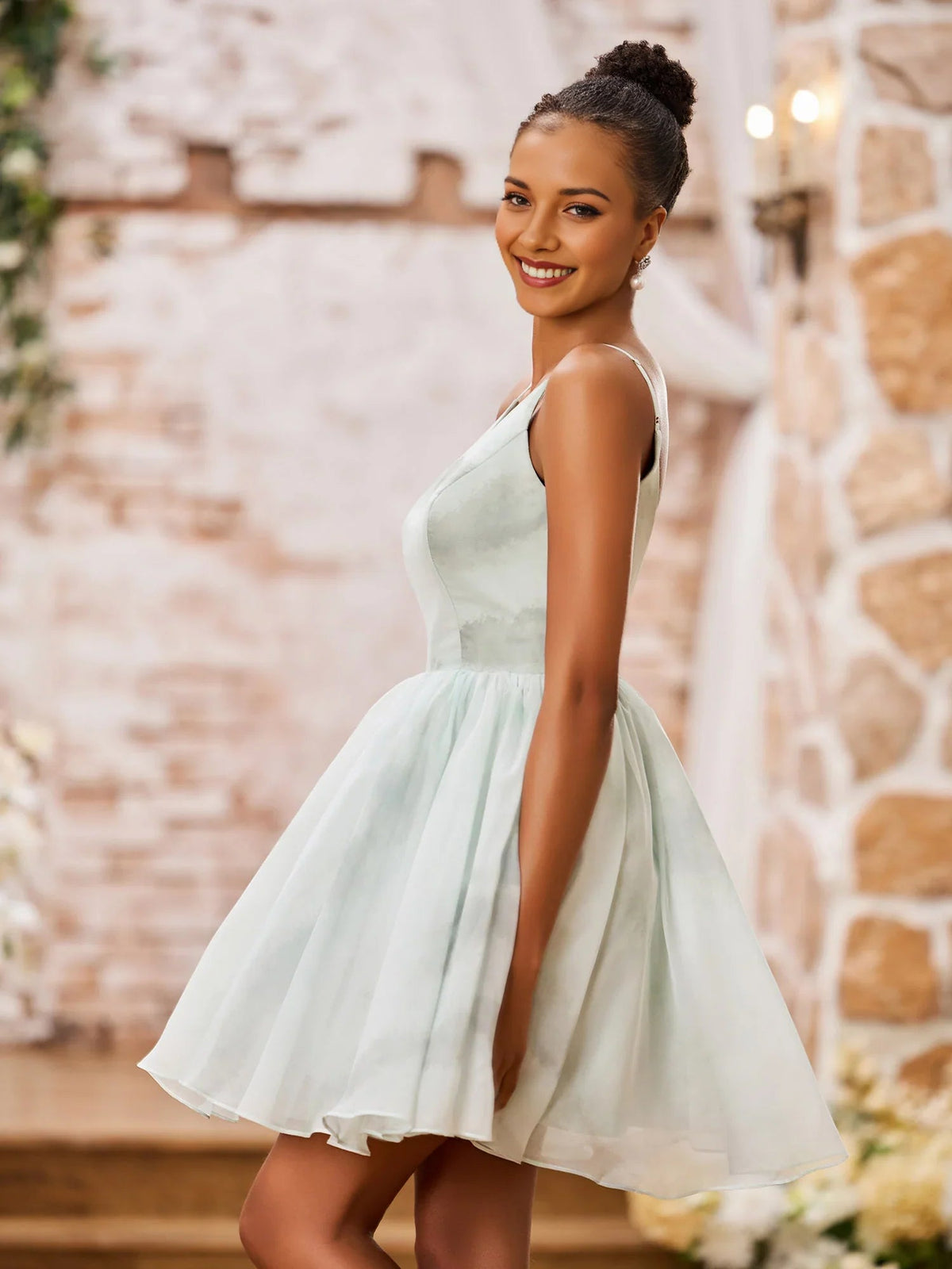 Mint green A-line mini dress with V-neck and sleeveless chiffon-style skirt, side view