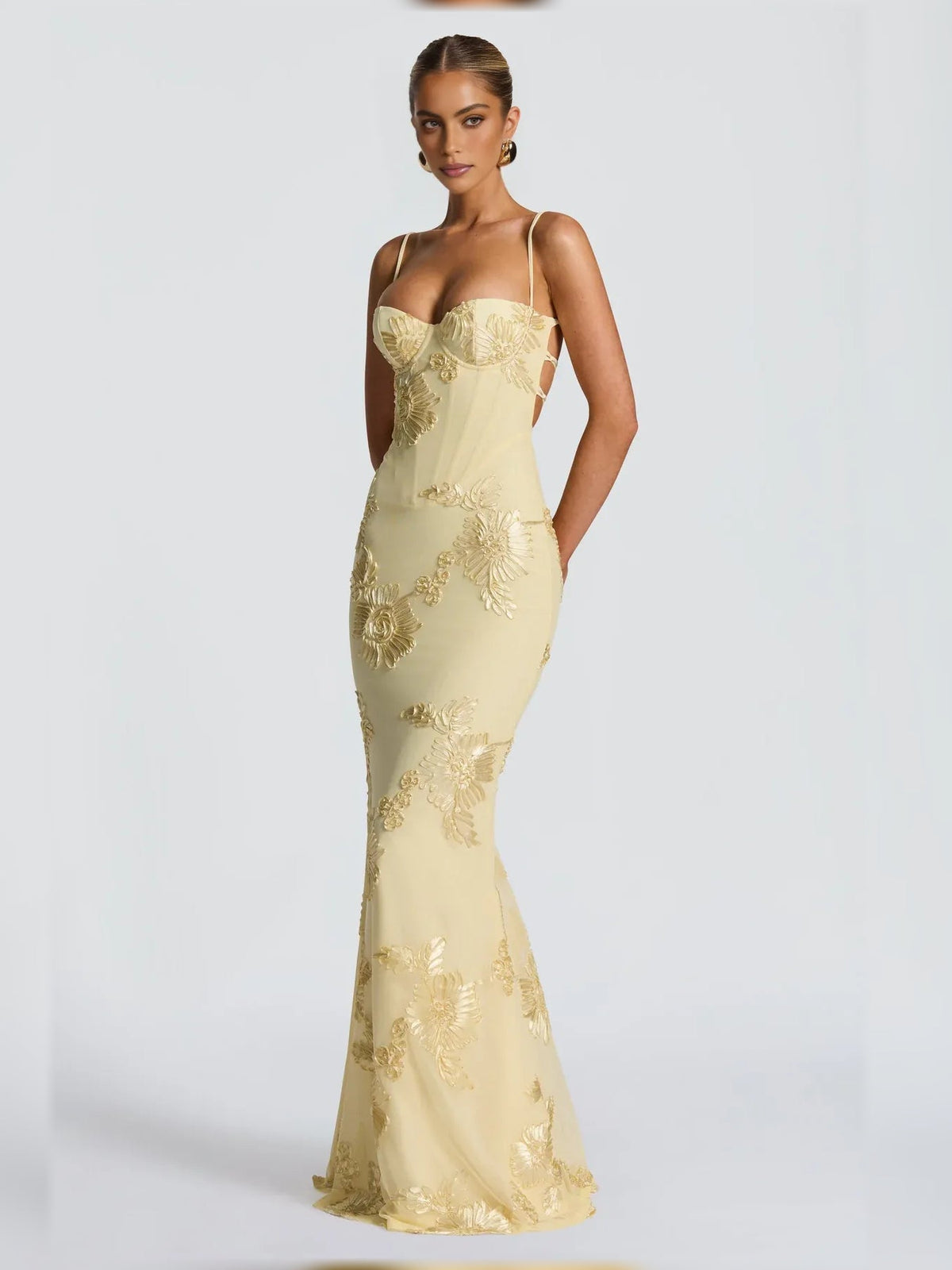 Pale lemon floor-length formal dress with sweetheart neckline and gold floral embroidery