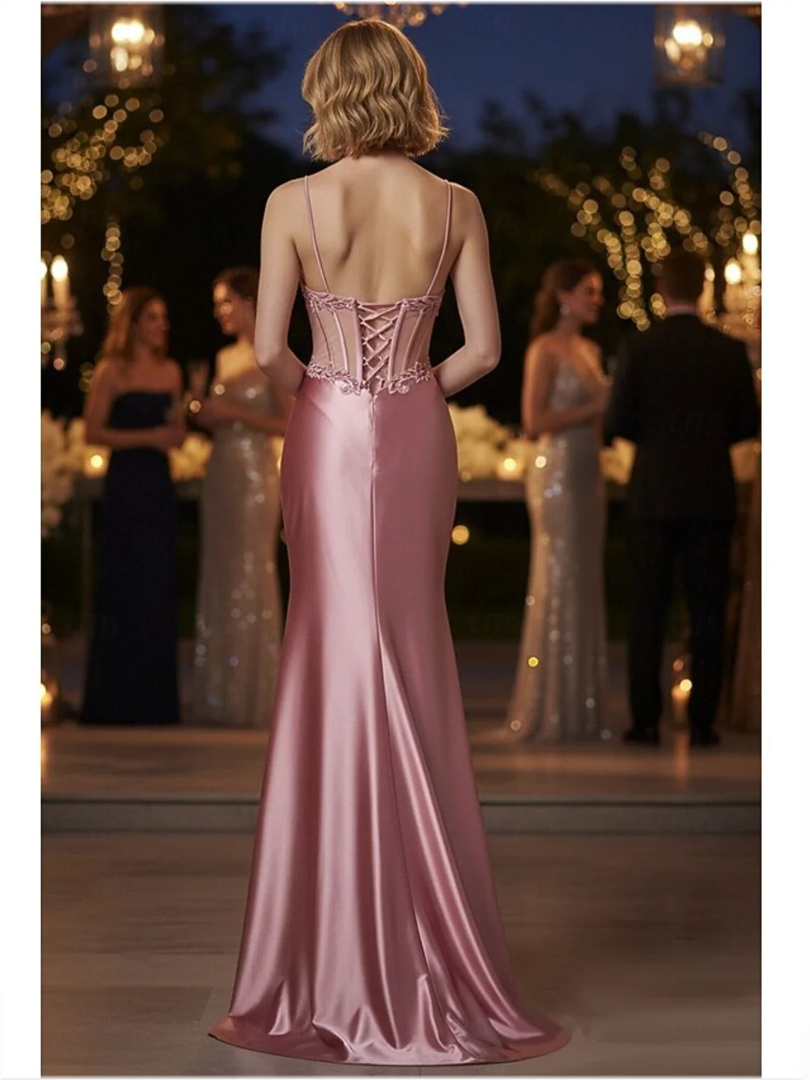 Rose gold satin sweetheart prom dress with lace-up back and long flowing skirt