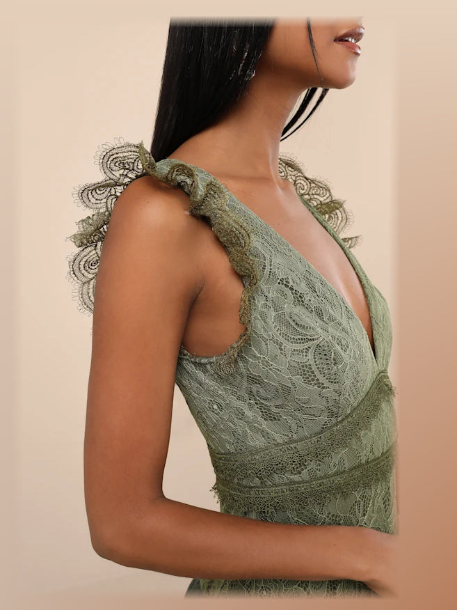 Green formal dress with mesh construction and maxi hem