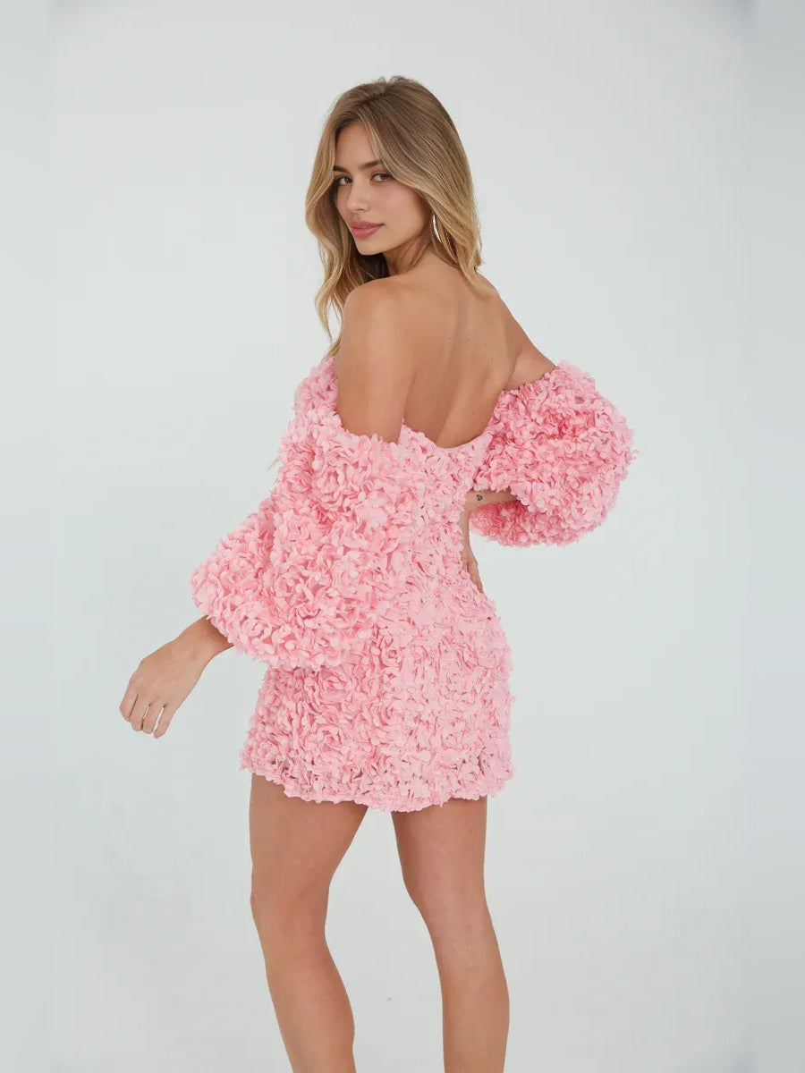 Light pink off-shoulder bodycon mini dress with floral ruffle texture, back view