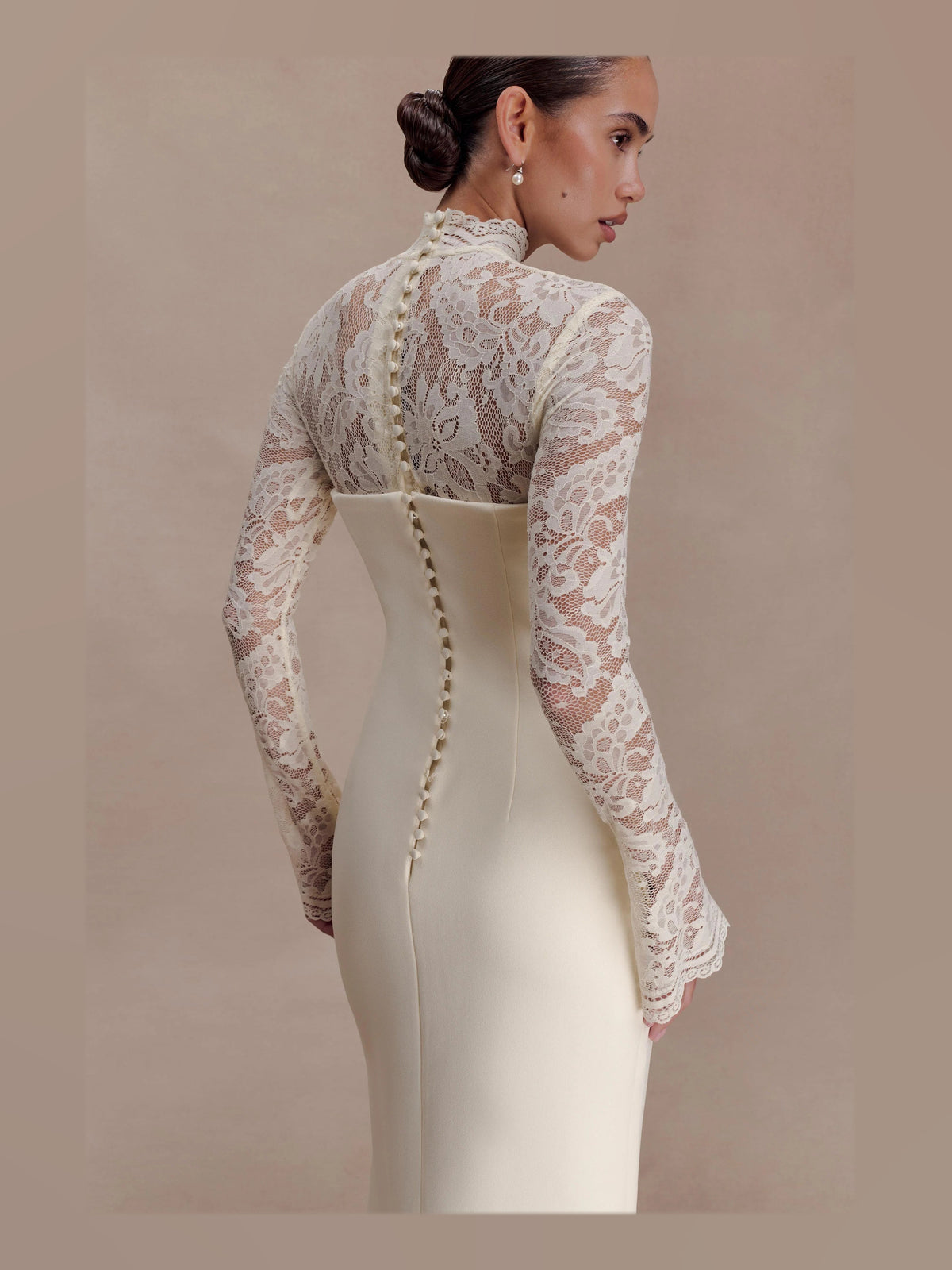 Ivory formal dress with mesh construction and maxi hem