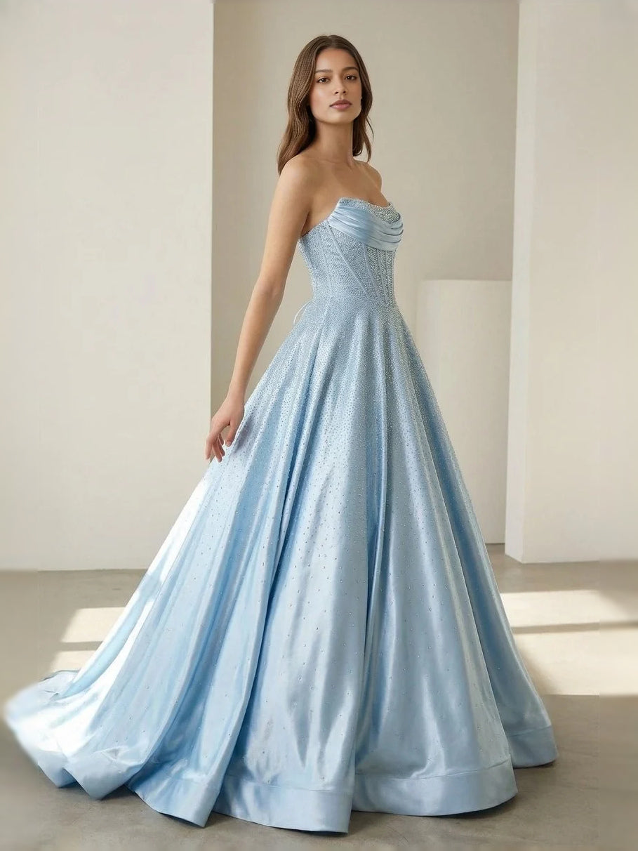 Sky blue strapless corset ball gown with textured fabric and full floor-length skirt