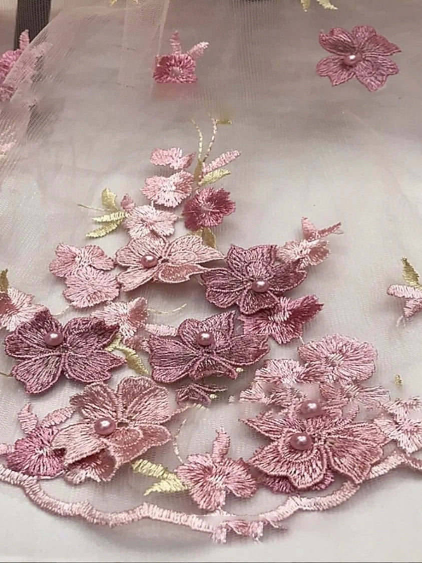 Floral embroidered pink tulle dress fabric with 3D flower appliqués