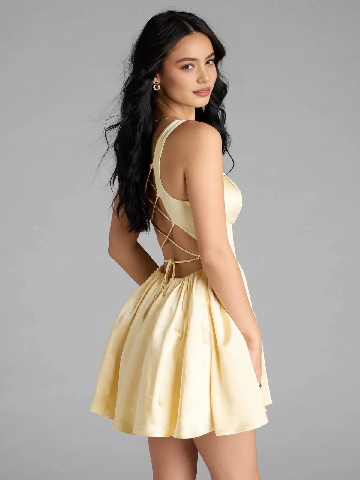 Canary satin mini A-line dress shown from side with strappy corset bodice