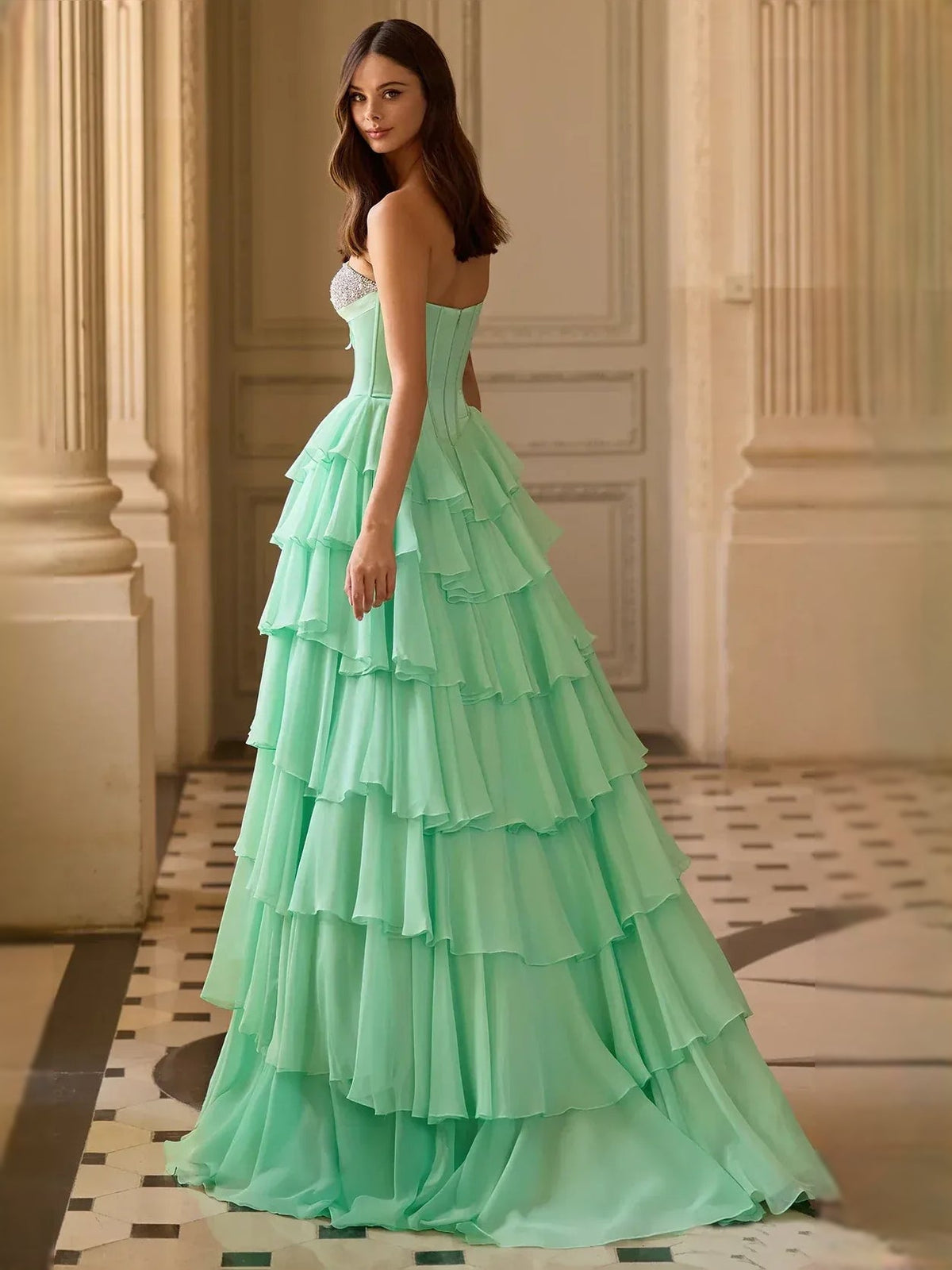 Mint green corset sweetheart maxi dress with layered ruffle skirt, side view