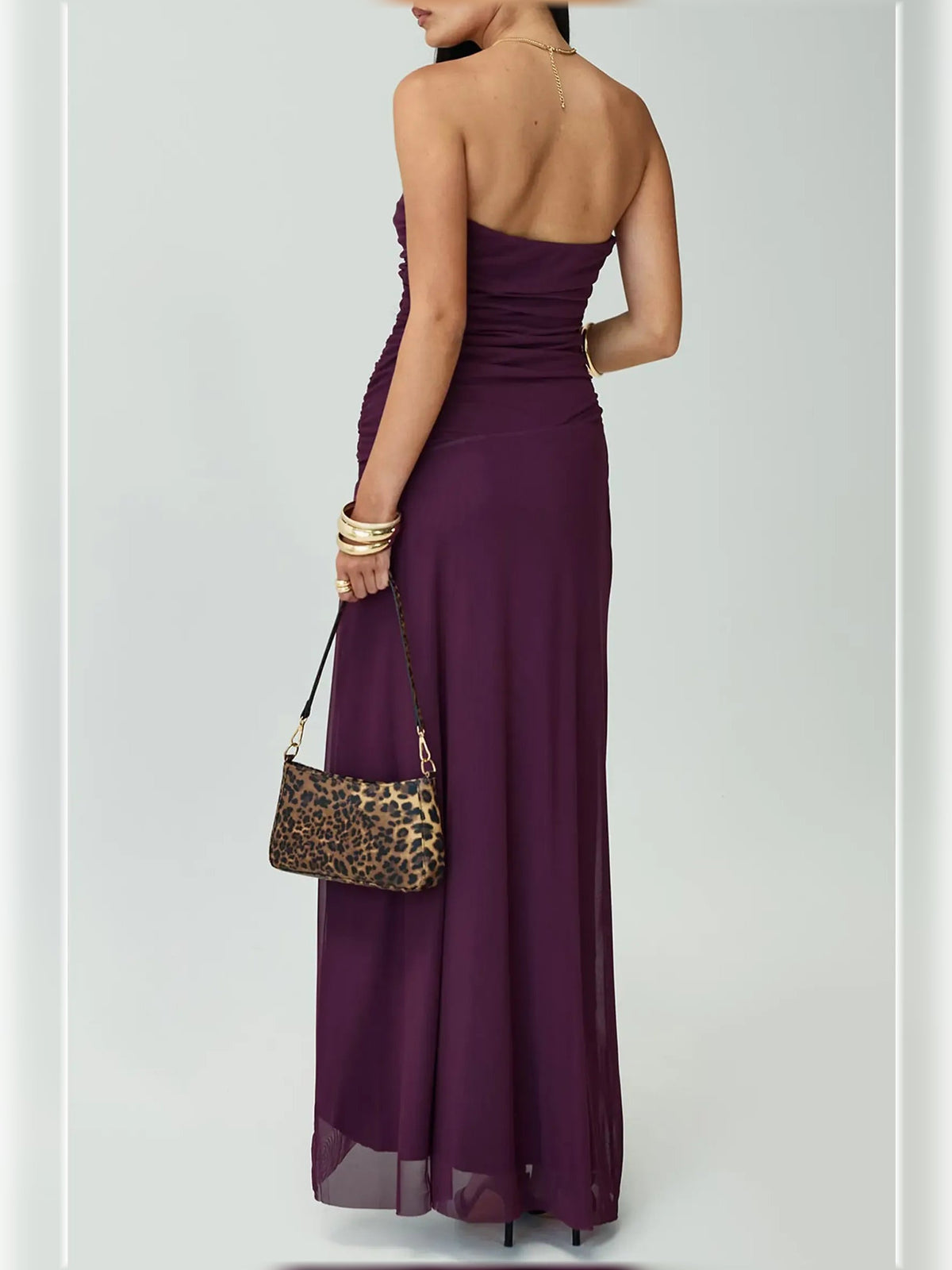 Purple strapless formal maxi dress from back, ruched bodice and high slit