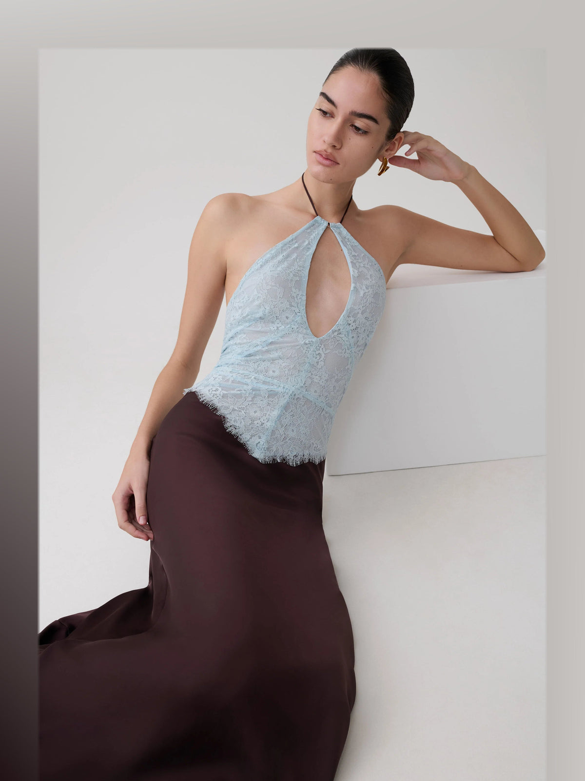 Chocolate formal dress with mesh construction and maxi hem