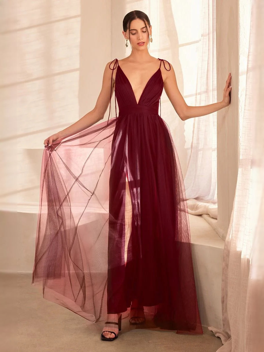 Burgundy draped V-neck A-line maxi tulle prom dress with tied straps and sheer overlay