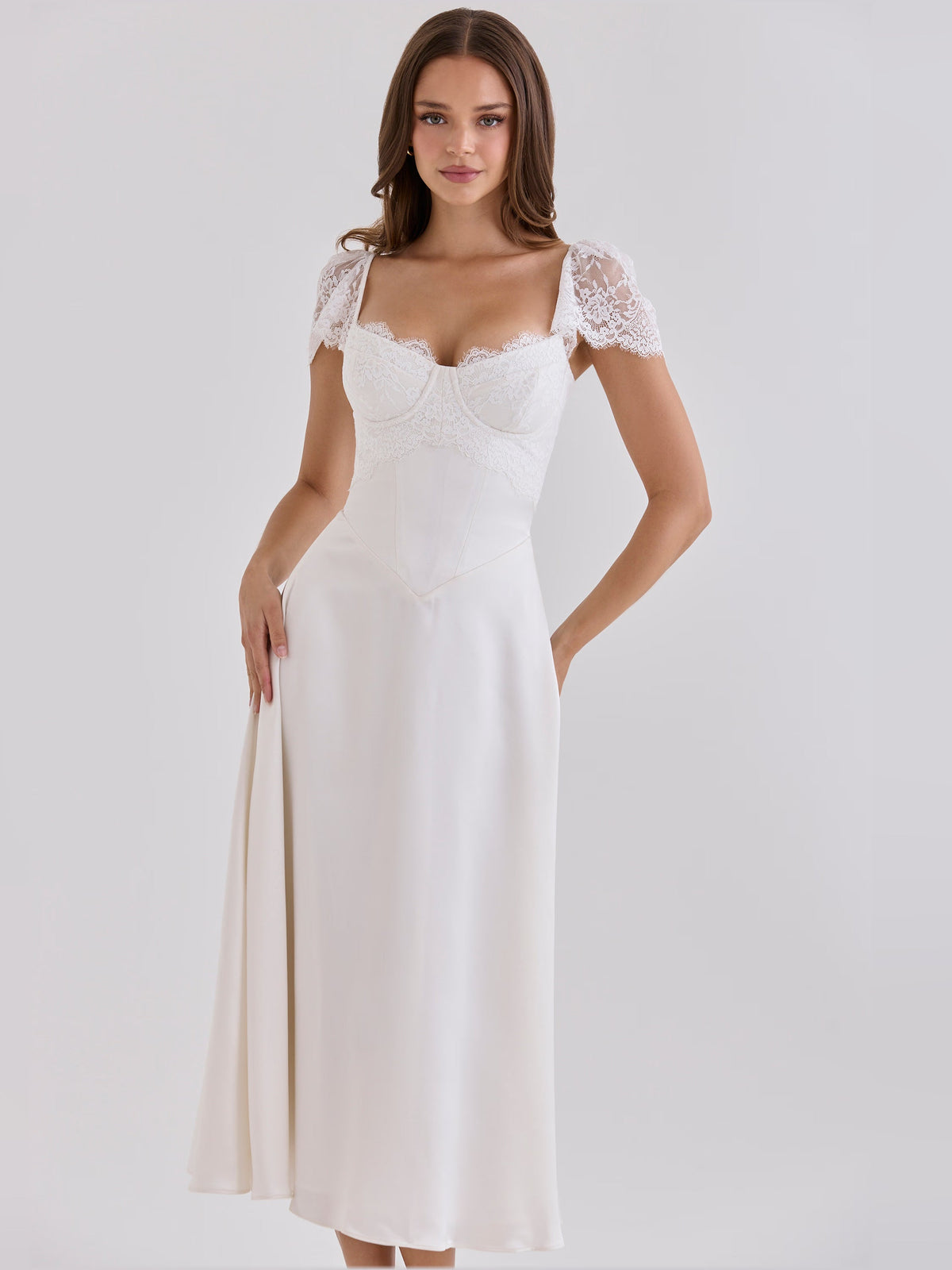 White satin midi dress with lace cap sleeves and fitted waist