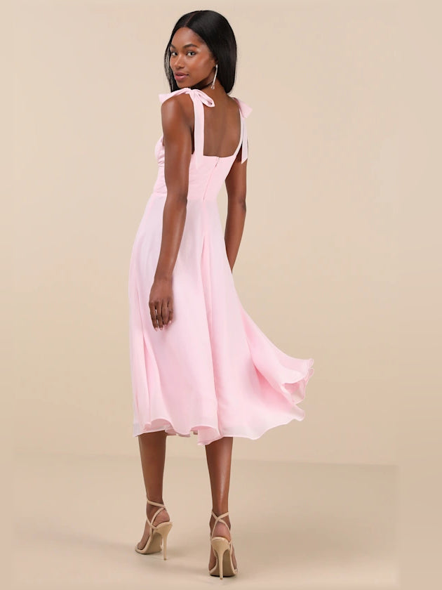 Light pink back tie-strap A-line midi dress with bow accents