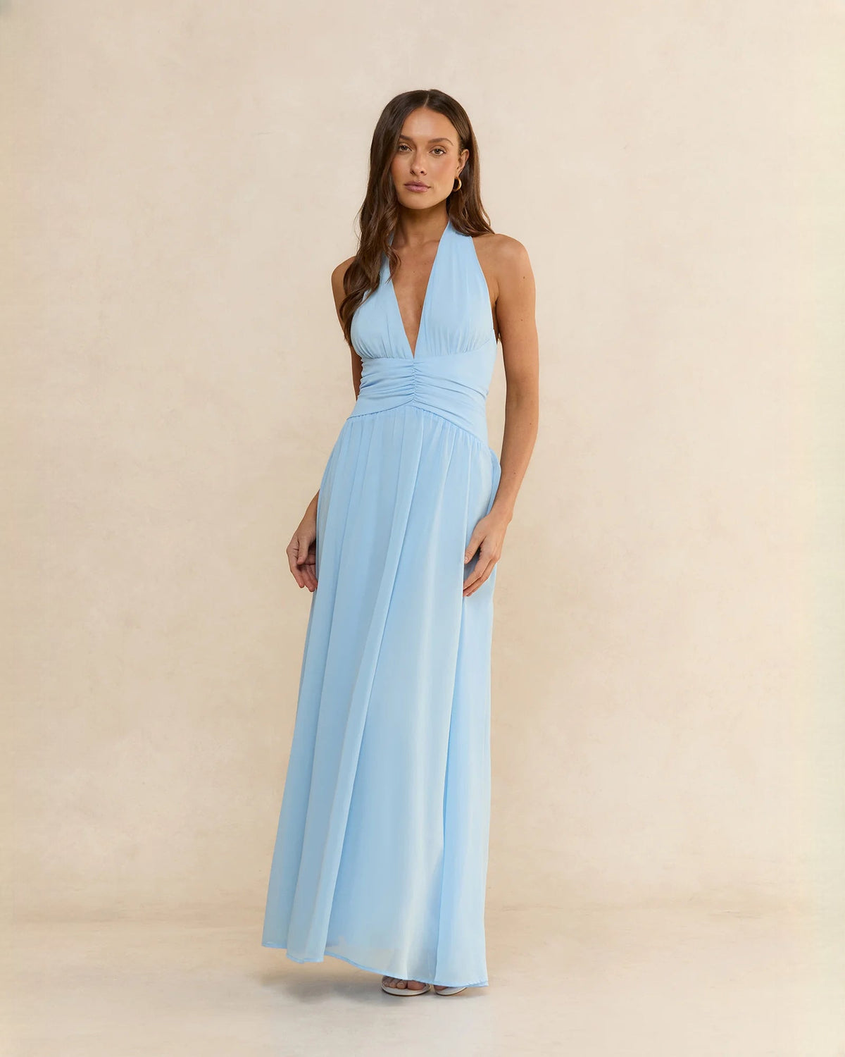 Light blue chiffon halter A-line maxi bridesmaid dress with V-neck bodice and gathered waist
