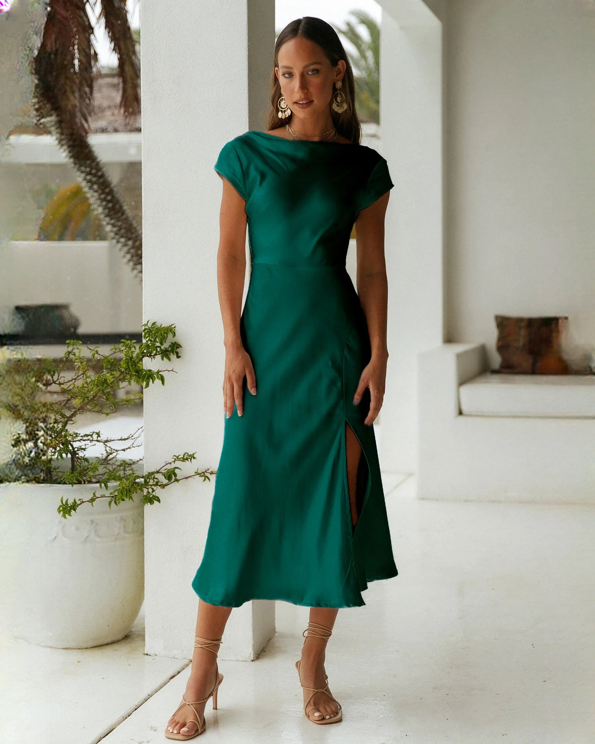 Emerald green satin sleeveless A-line bridesmaid dress with side slit, midi length
