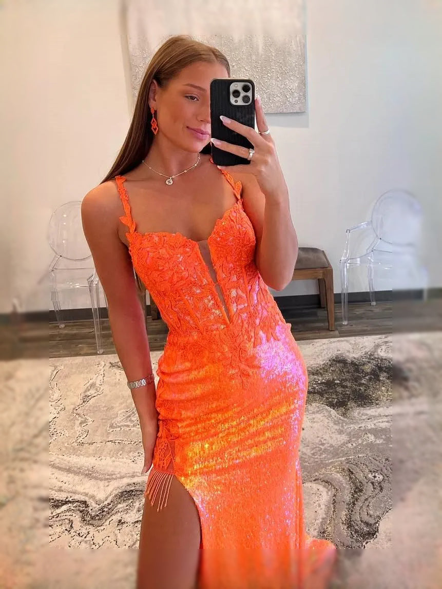 Orange sequin V-neck mermaid prom dress with spaghetti straps and thigh slit