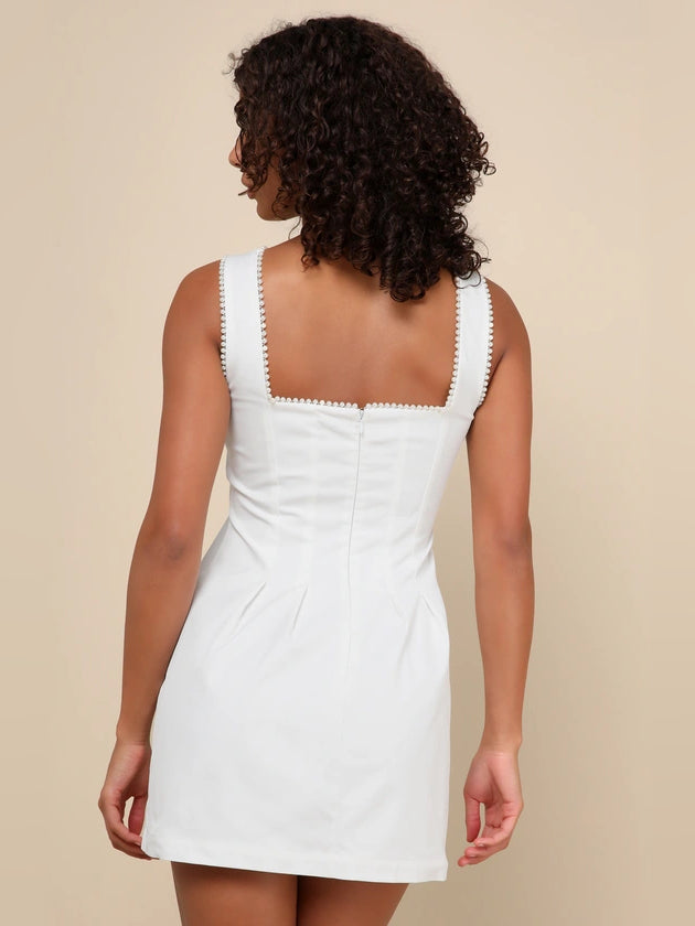 White square-neck mini dress back view with beaded strap trim