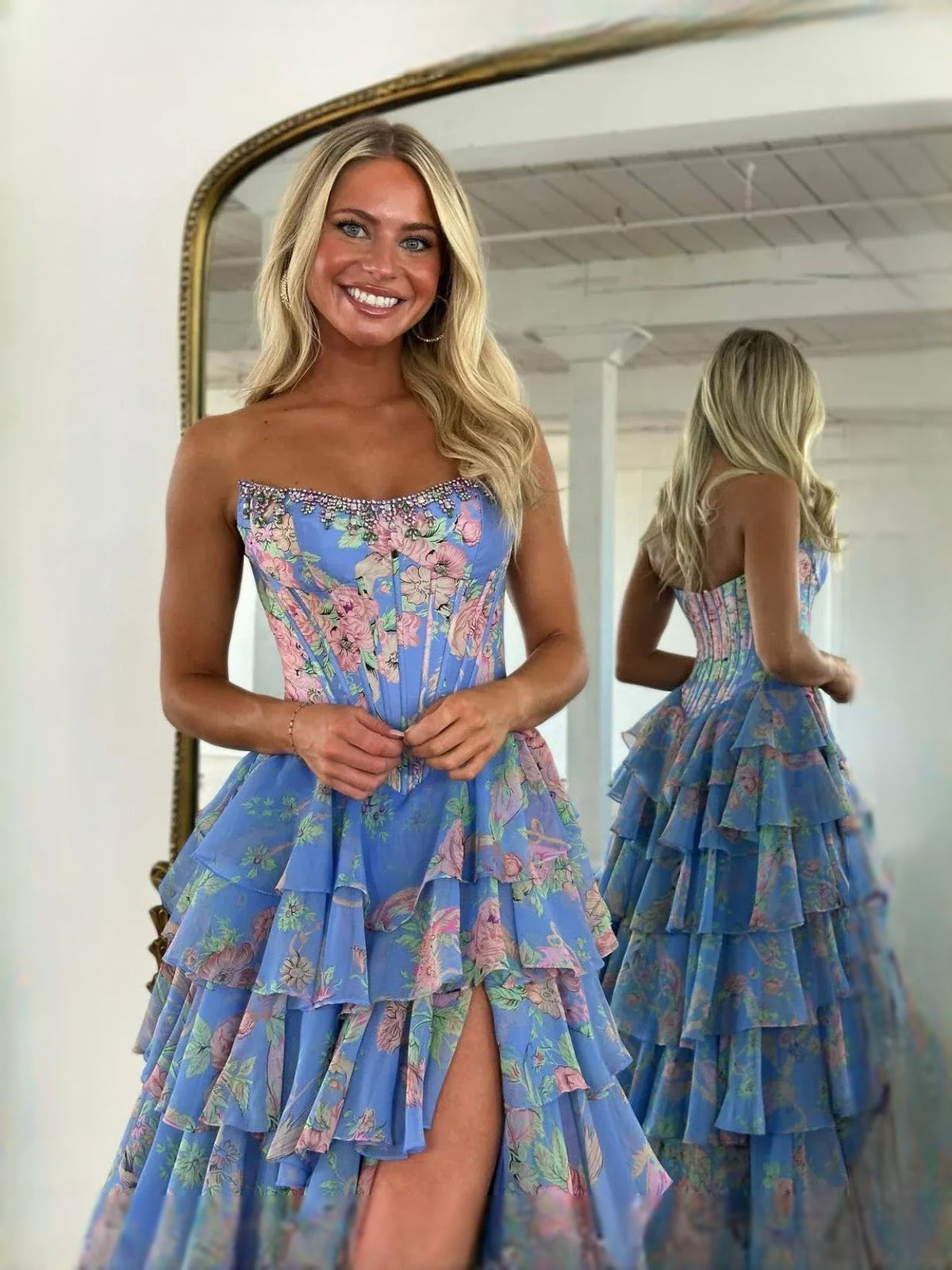 Blue floral corset-style sweetheart A-line prom dress, open back with tiered ruffles