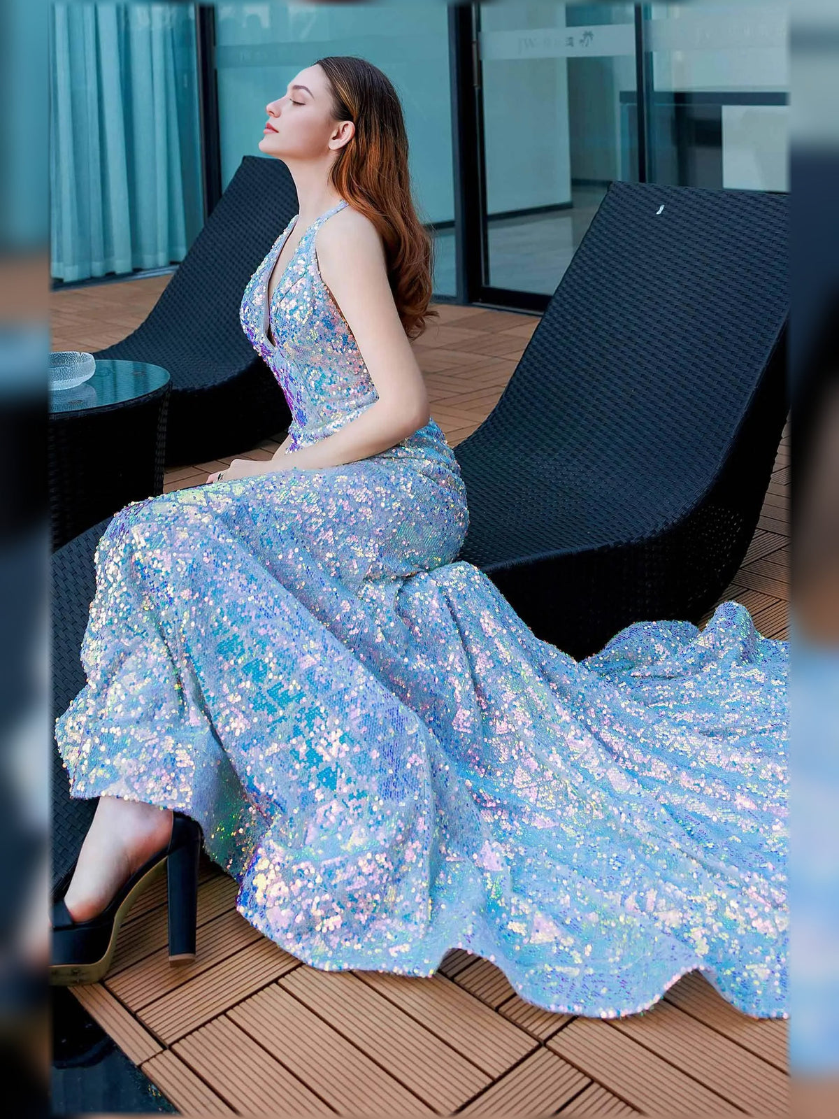 Light blue beaded halter-neck open-back evening gown with full skirt