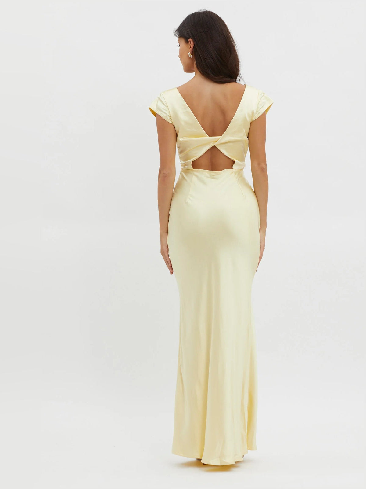 Yellow midi dress showing open back with twisted straps