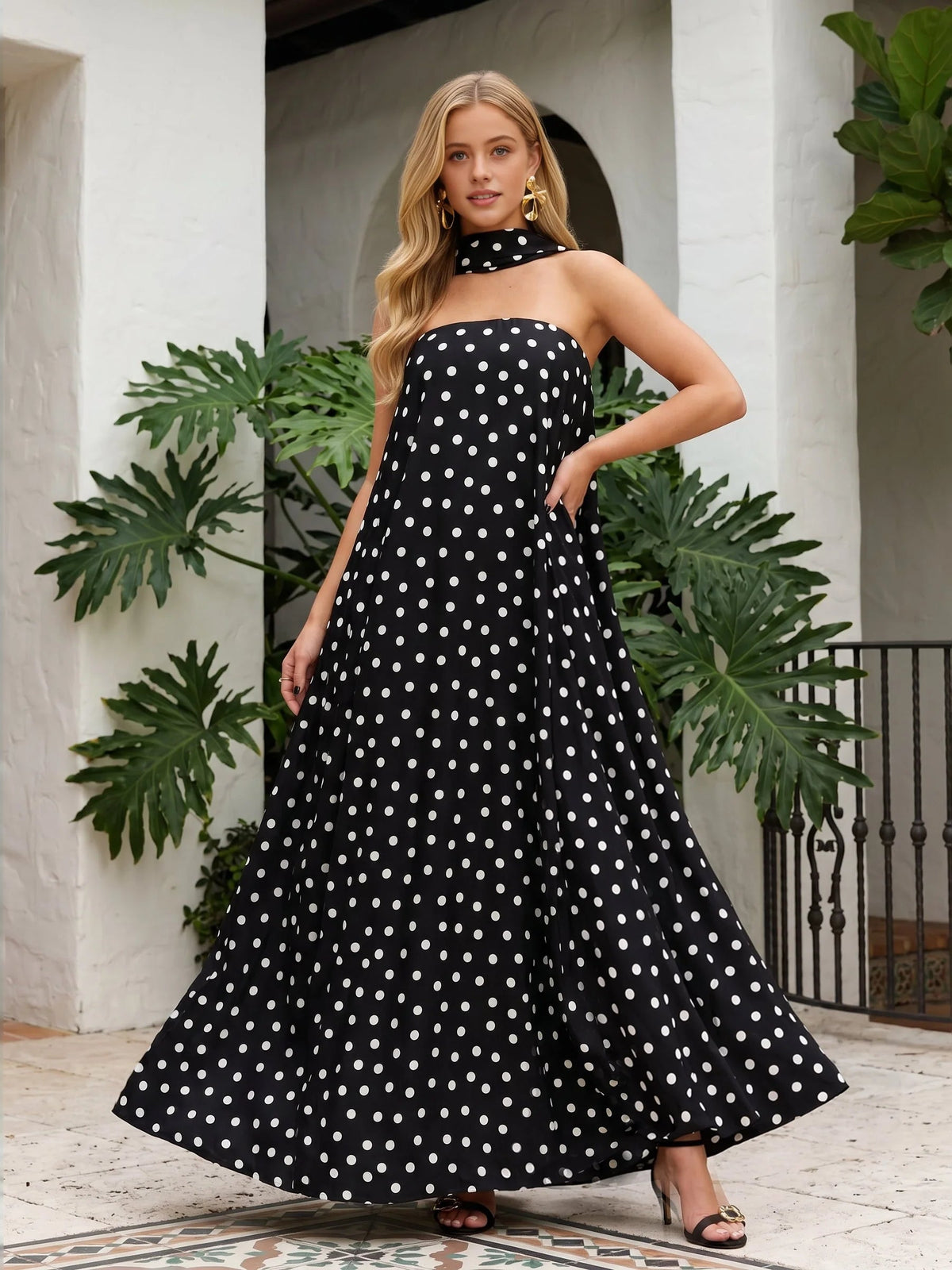 Strapless A-line maxi dress, black with white polka dots and choker neckline