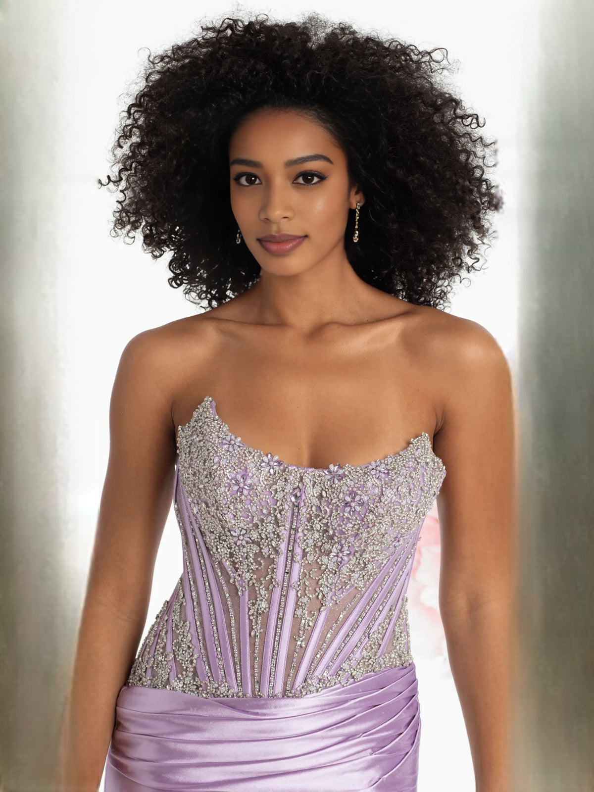Lavender strapless rhinestone corset bodice with gathered details and satin skirt