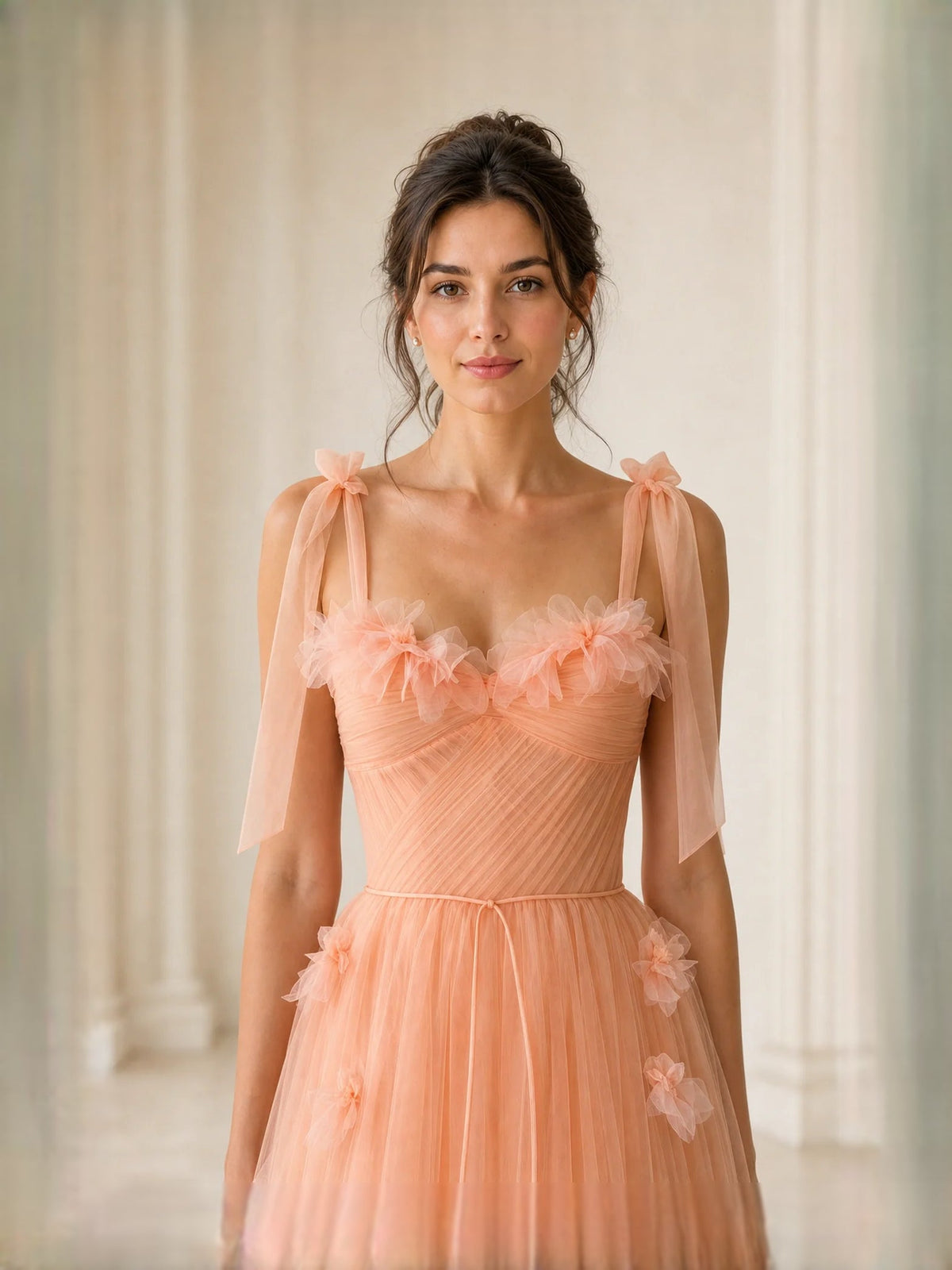 Orange corset-style tulle prom dress with sweetheart neckline and floral shoulder ties