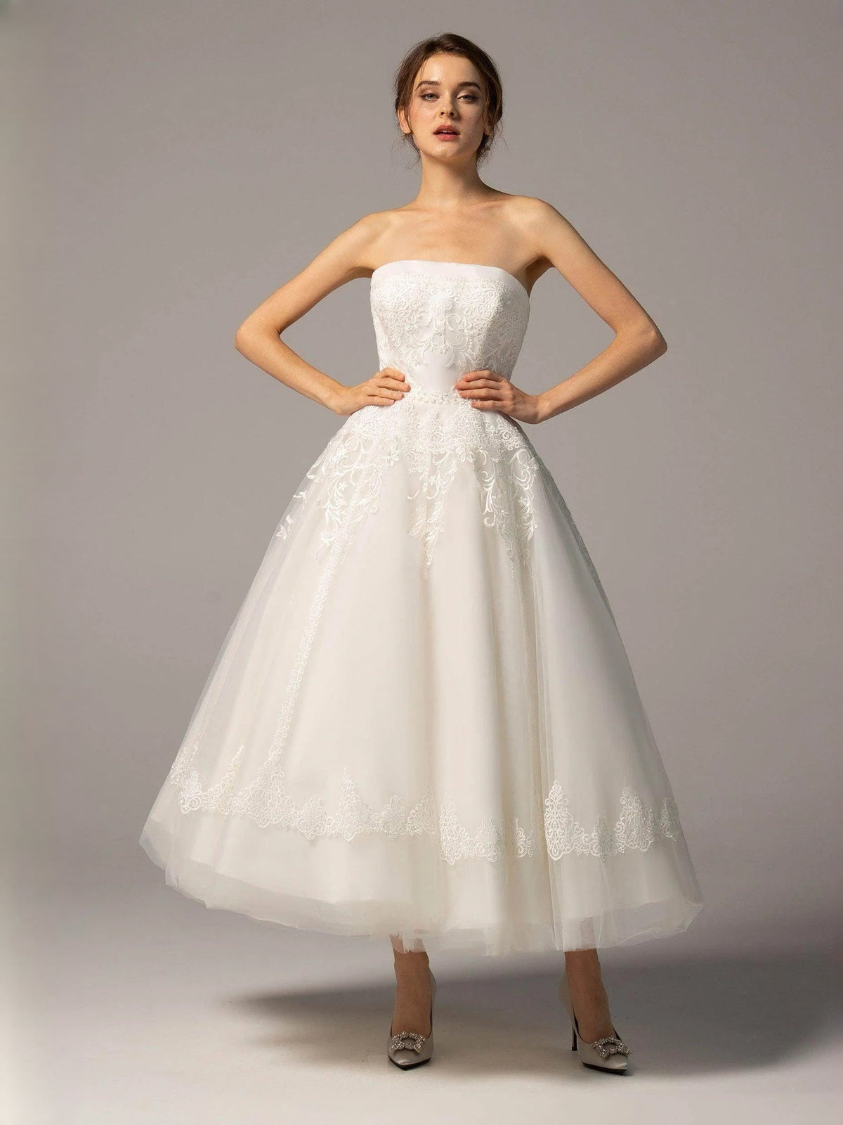 Ivory strapless A-line short wedding dress with sweetheart bodice and full tulle skirt