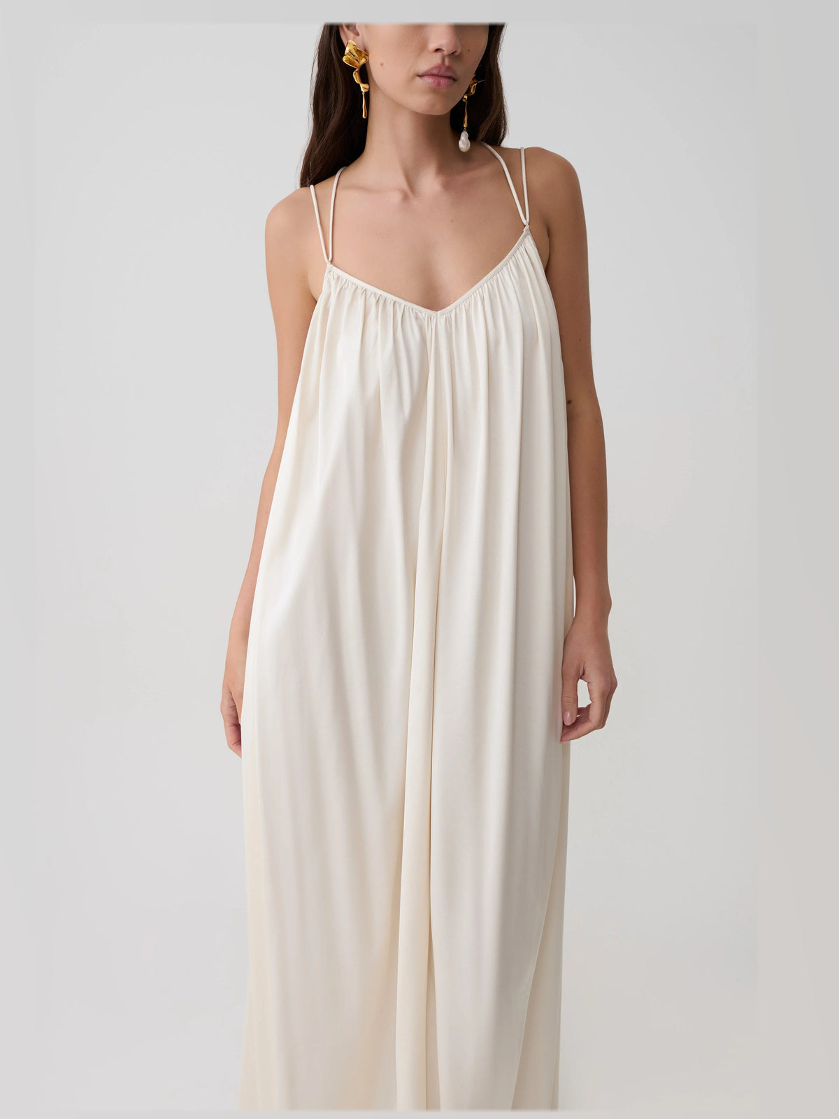 Buttercream formal dress with satin construction and maxi hem
