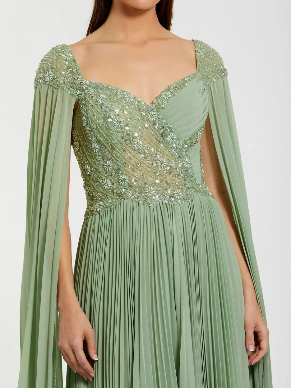 Dusty sage sweetheart formal dress, beaded bodice and pleated skirt with sheer cape sleeves