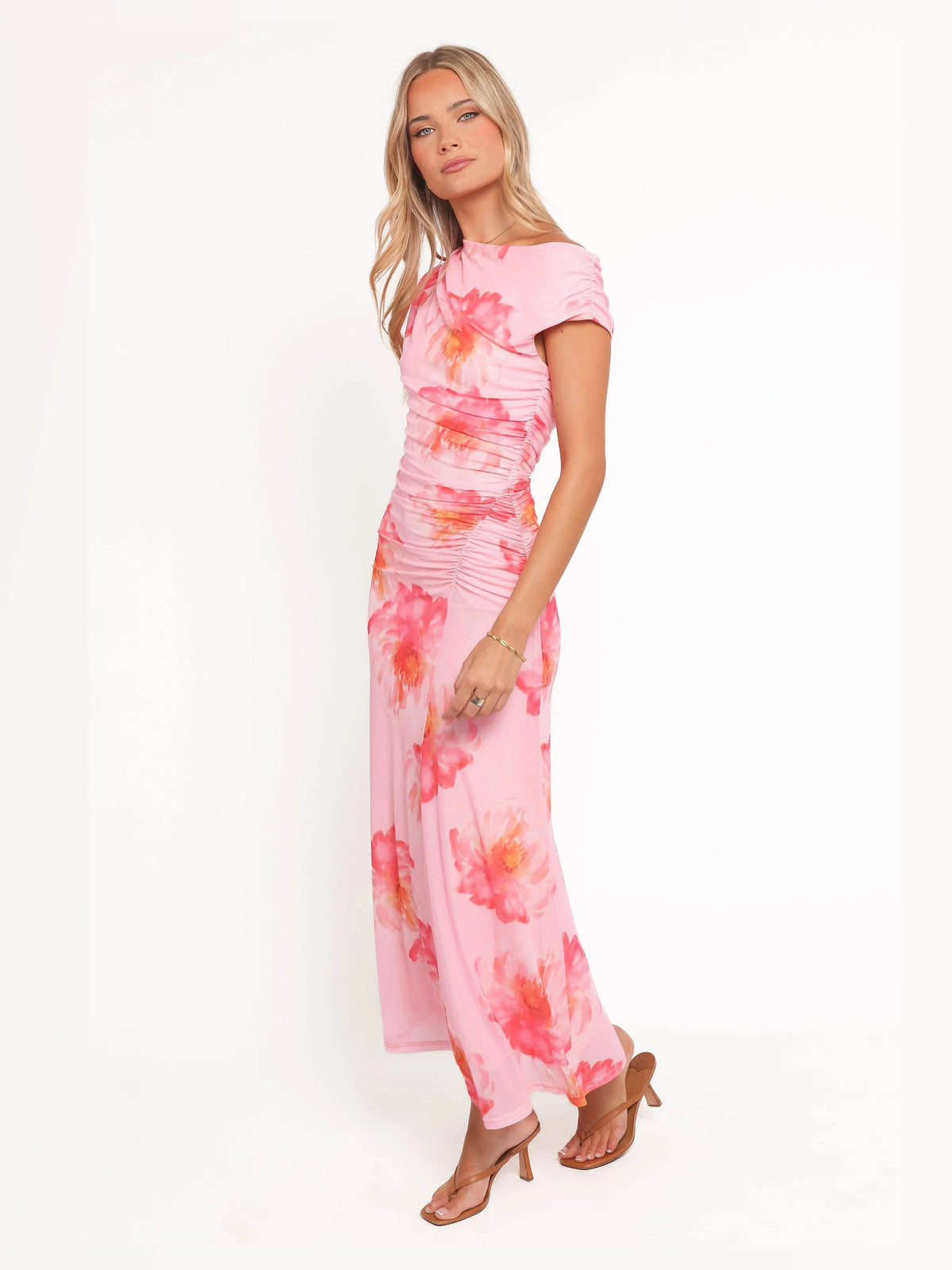 Red formal dress with structured woven fabric construction and maxi hem