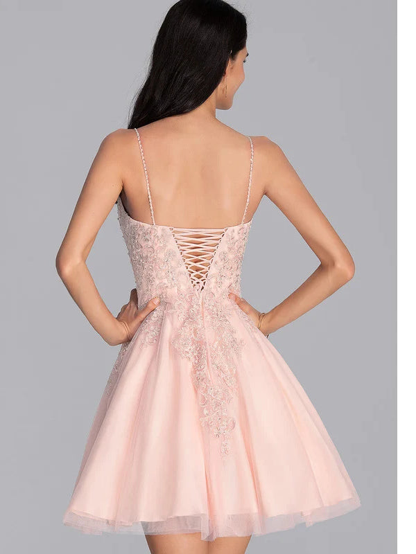 Blush pink corset mini prom dress, open back with beaded floral straps and A-line tulle skirt