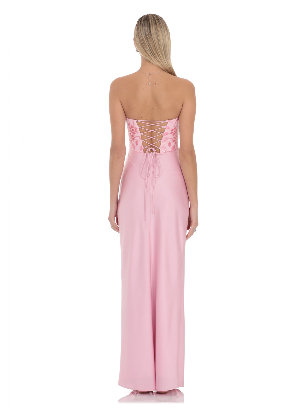 Pink bridesmaid dress with structured woven fabric construction and maxi hem