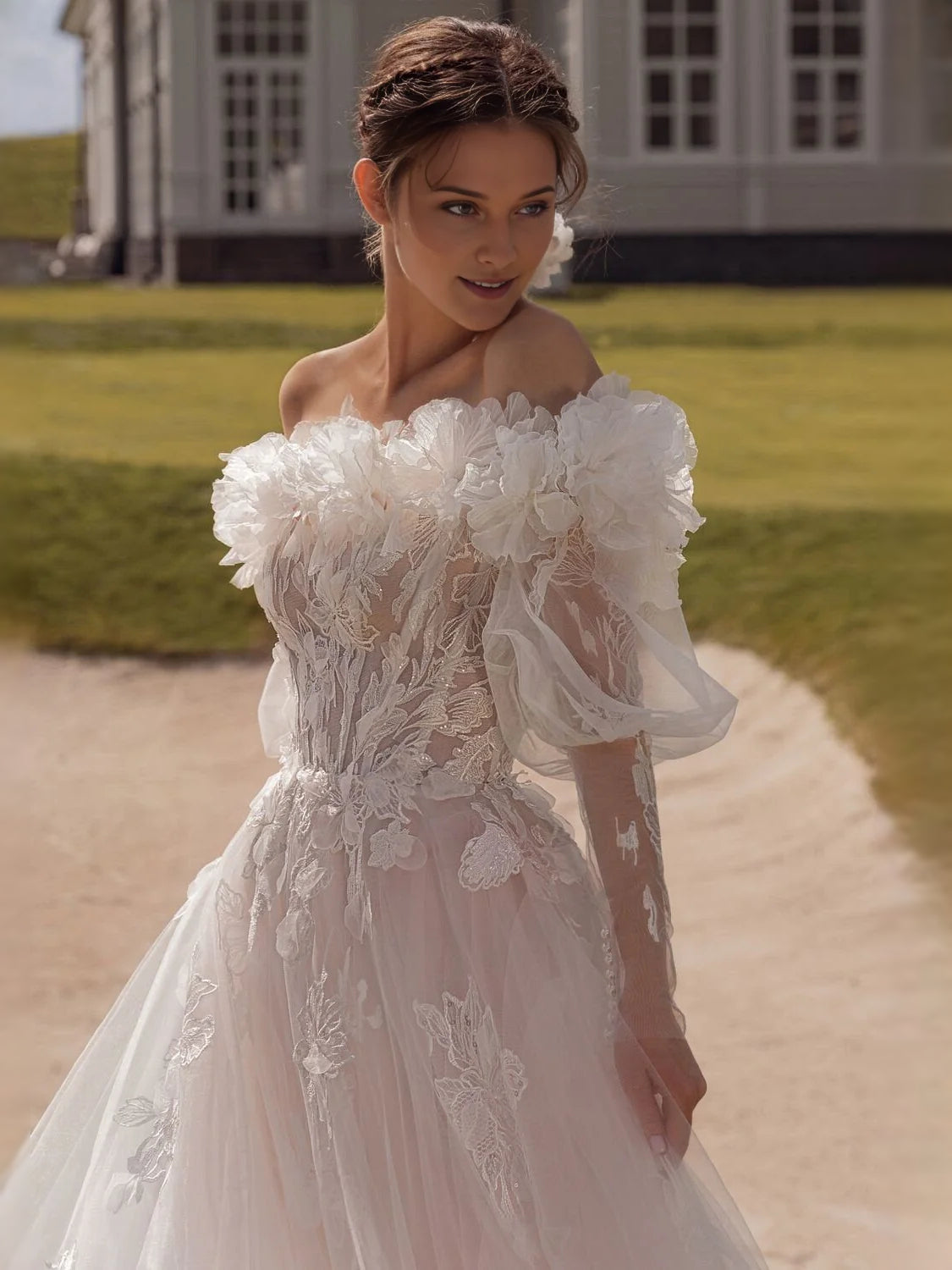 Ivory off-shoulder floral applique wedding dress with sweetheart neckline and A-line tulle skirt