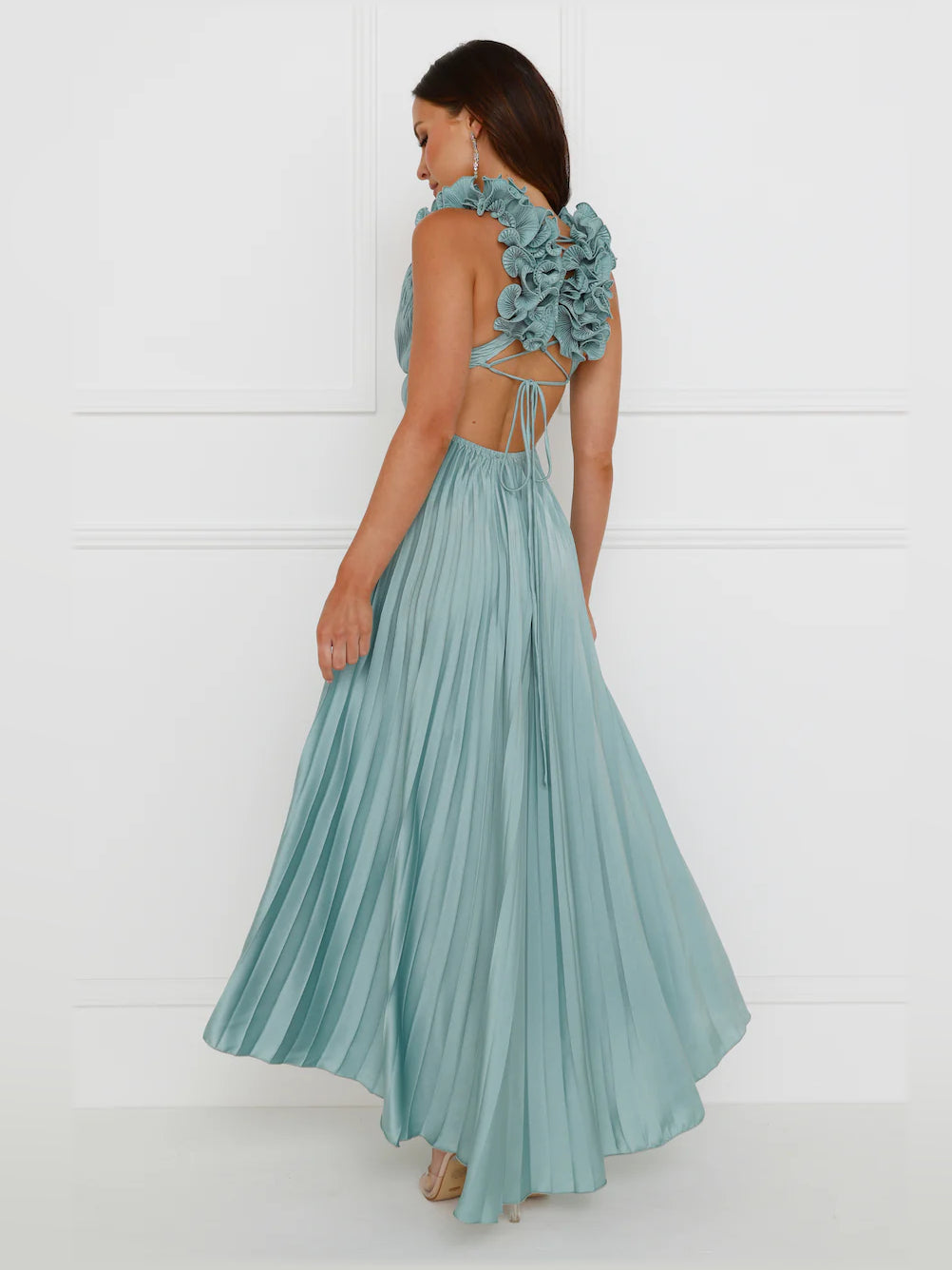 Sage satin midi formal dress with open back and large ruffled shoulder appliques