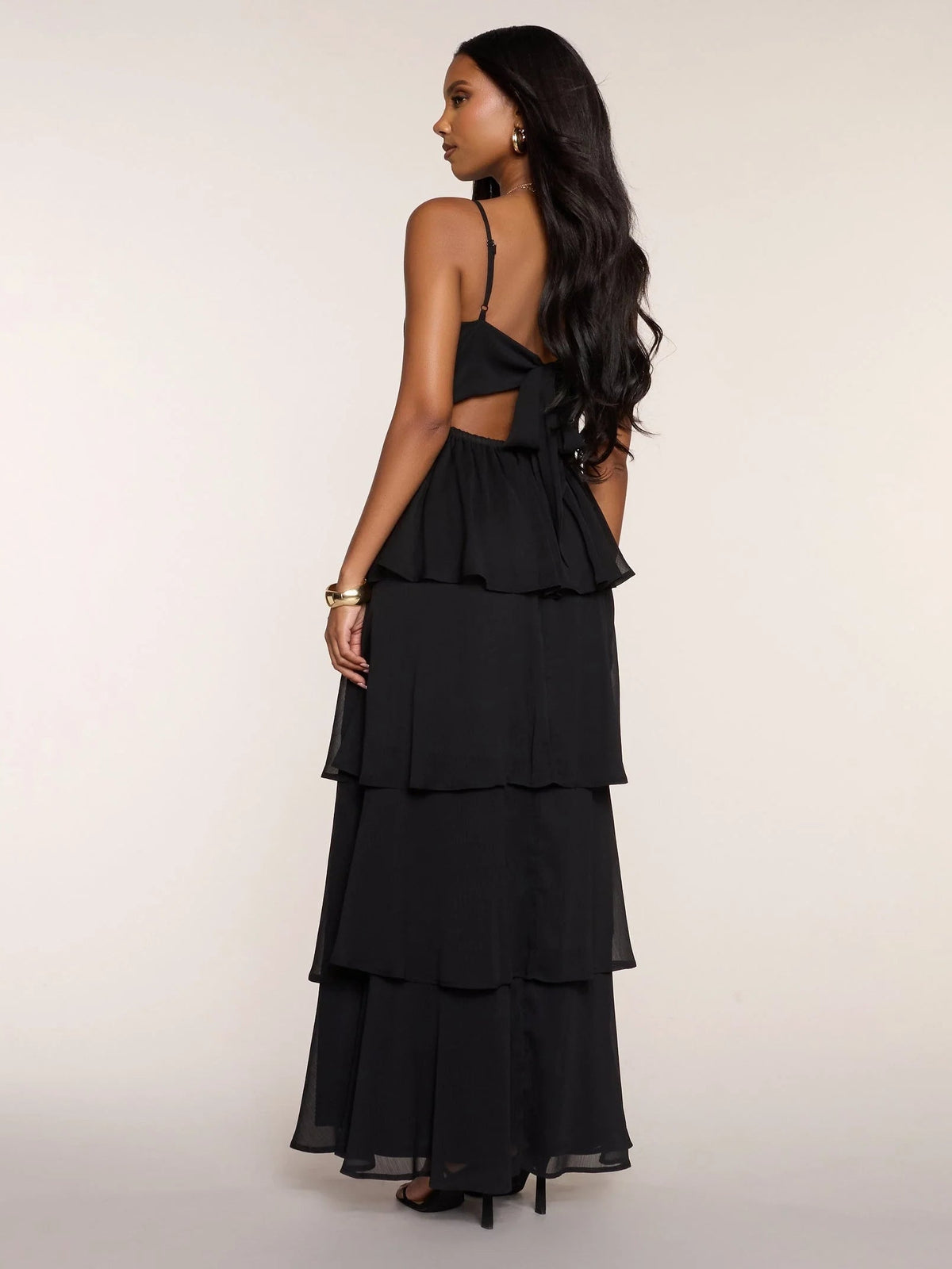 Black chiffon tiered ruffle prom dress with back cutout and spaghetti straps