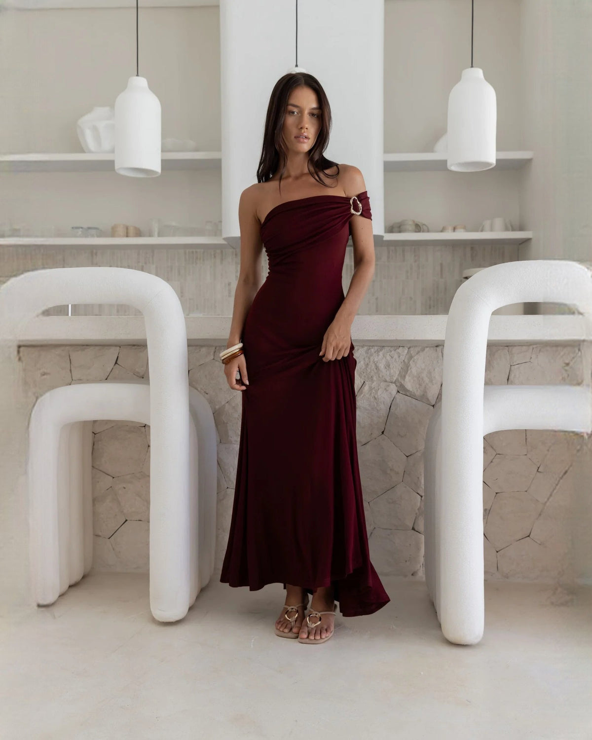 Wine red off-shoulder A-line maxi bridesmaid dress with side ruching and ring detail