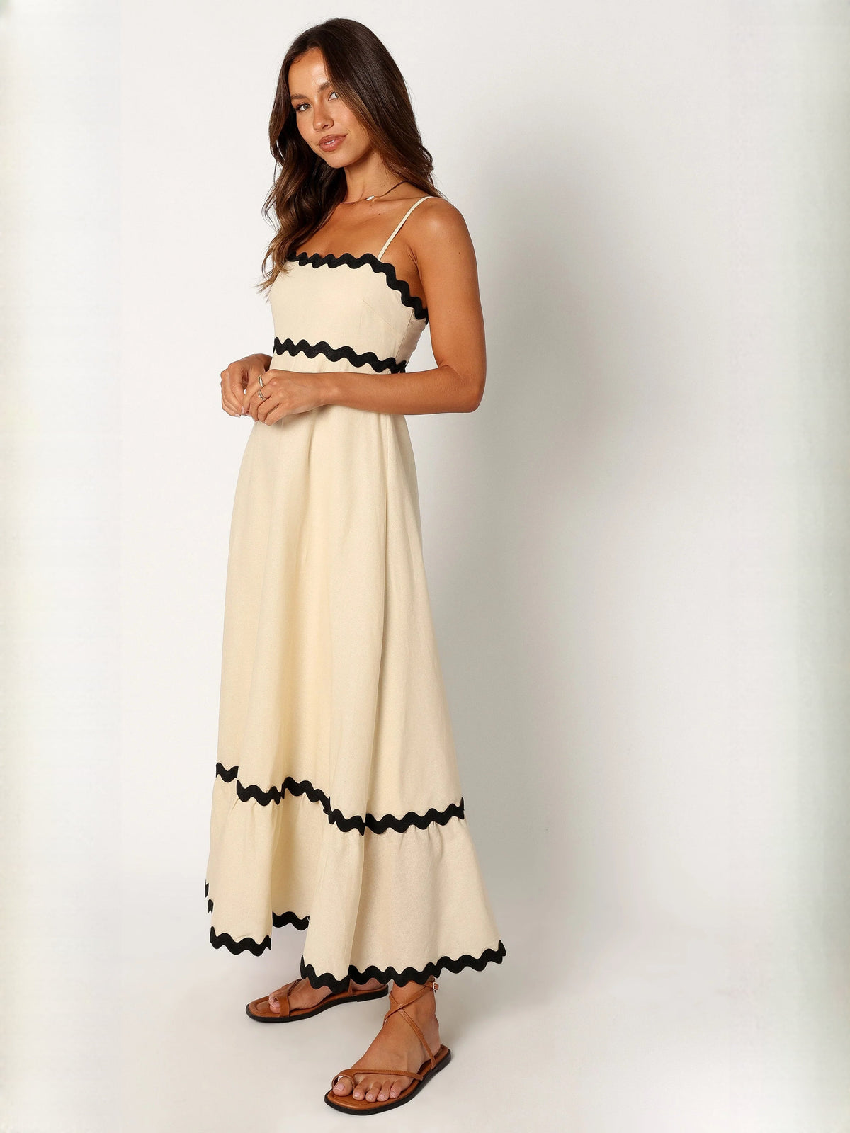 Black a-line maxi formal dress with strapless neckline, alternate full-length view