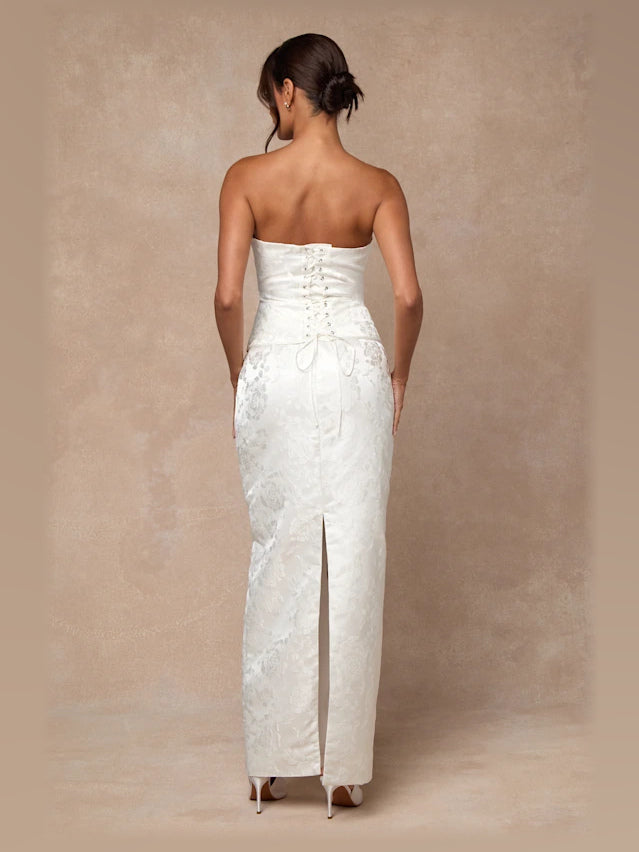 White formal dress with satin construction and maxi hem