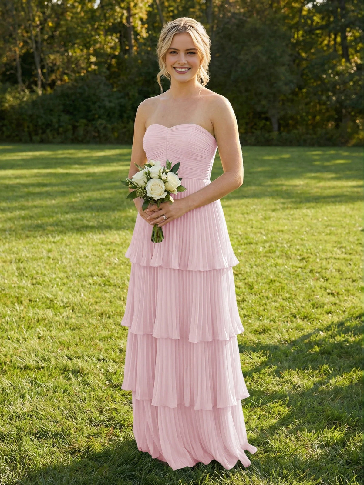 Blush pink chiffon maxi bridesmaid dress, sweetheart bodice, tiered ruffles.