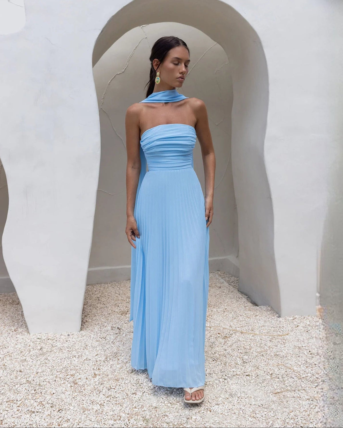 Blue strapless chiffon maxi A-line dress with pleated bodice and flared skirt