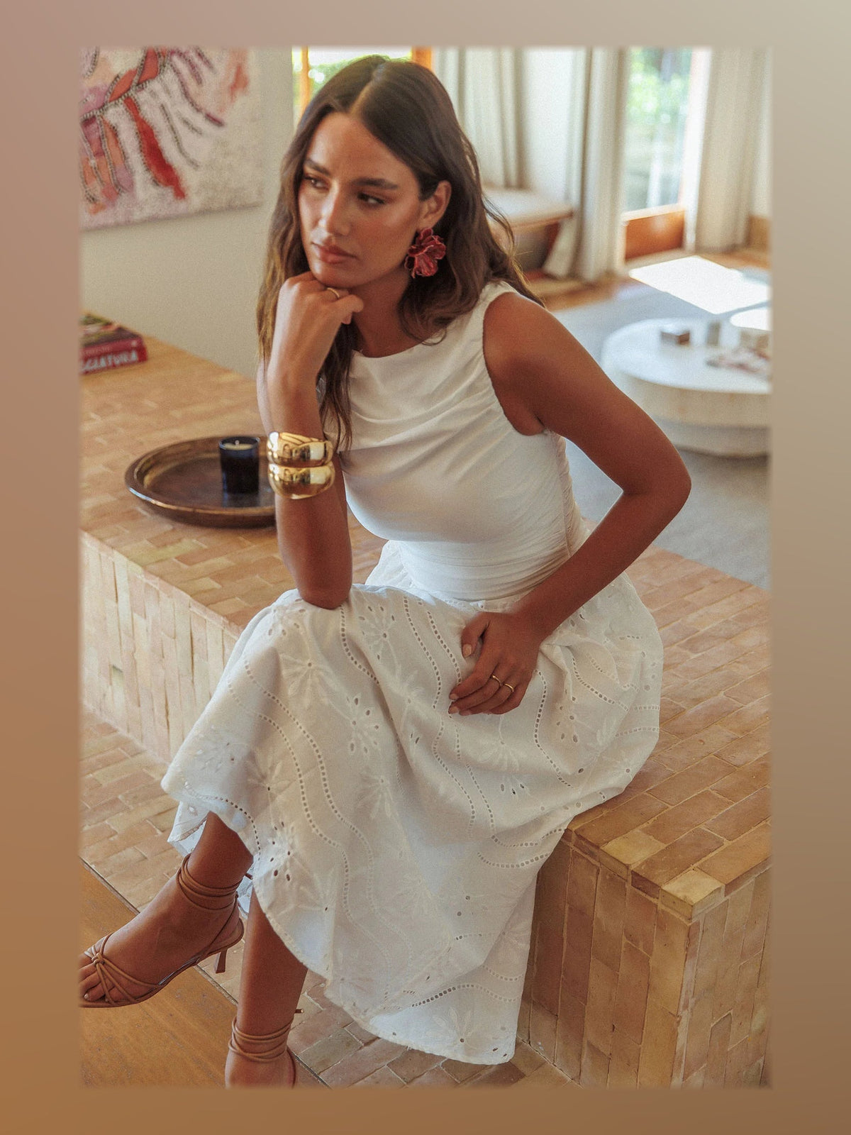 White formal dress with structured woven fabric construction and maxi hem