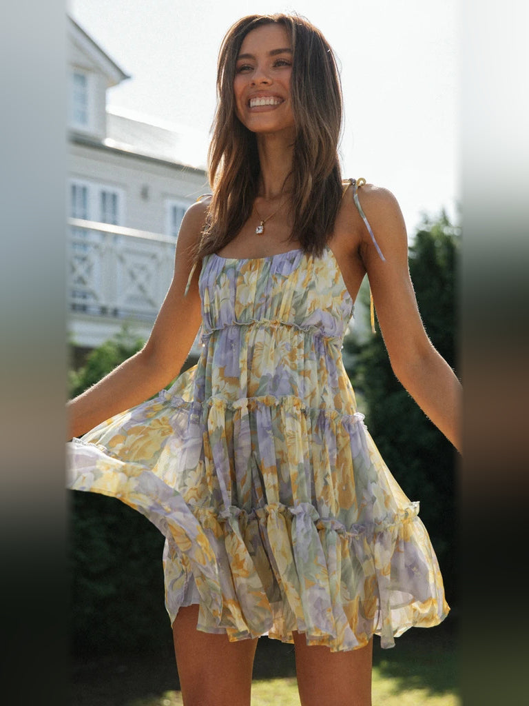 Floral tiered mini dress with spaghetti straps and layered ruffle hem