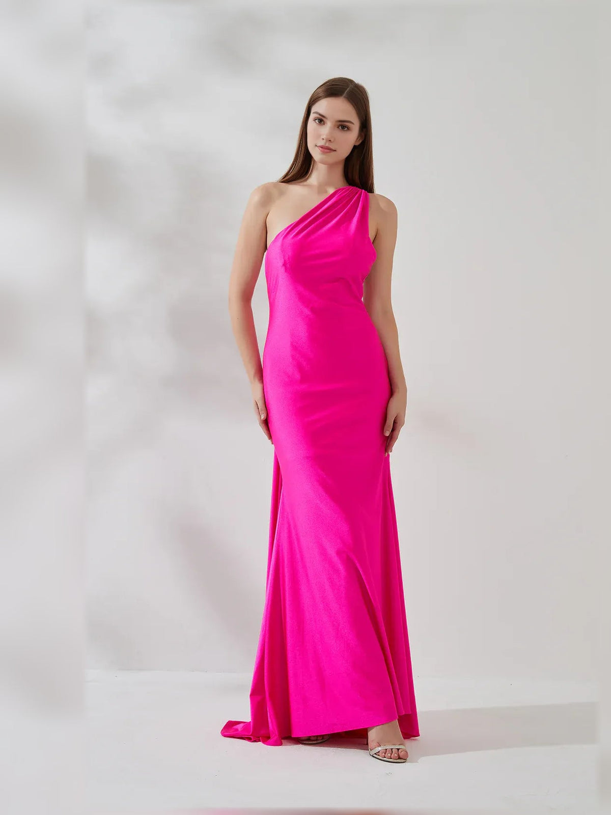 Hot pink one-shoulder mermaid formal dress, full front view with long skirt