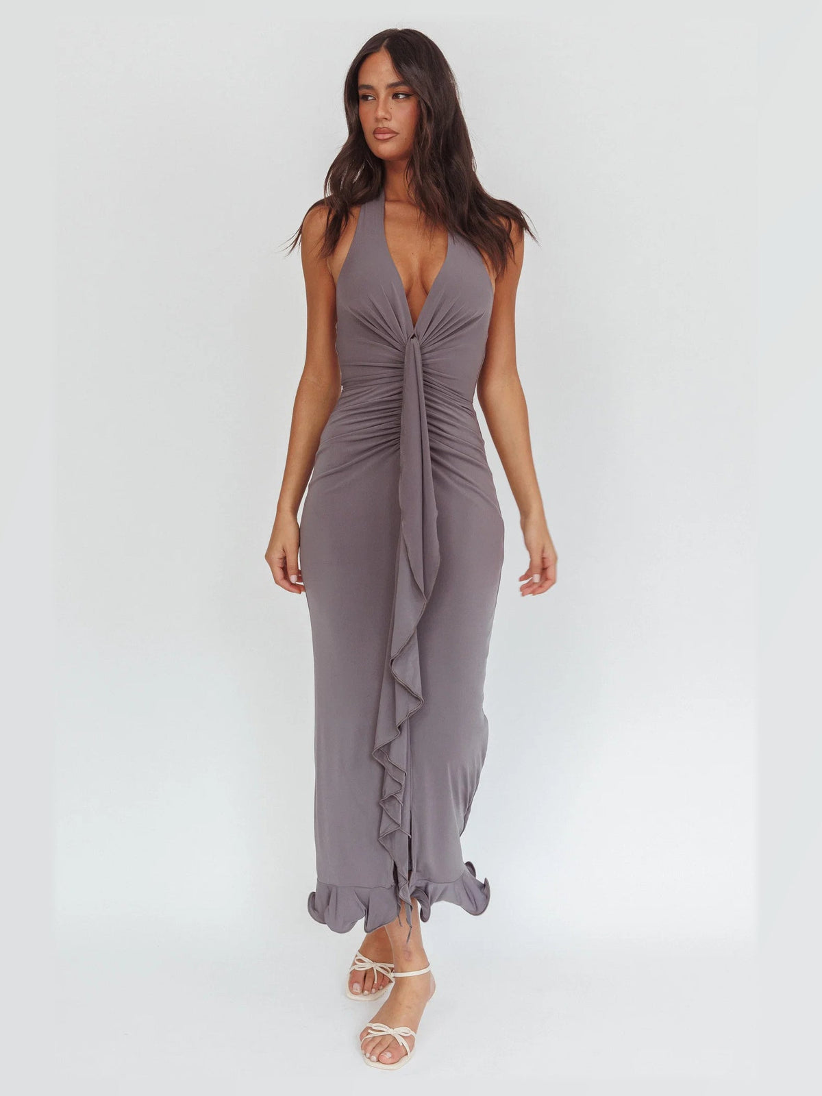 Taupe formal dress with structured woven fabric construction and maxi hem