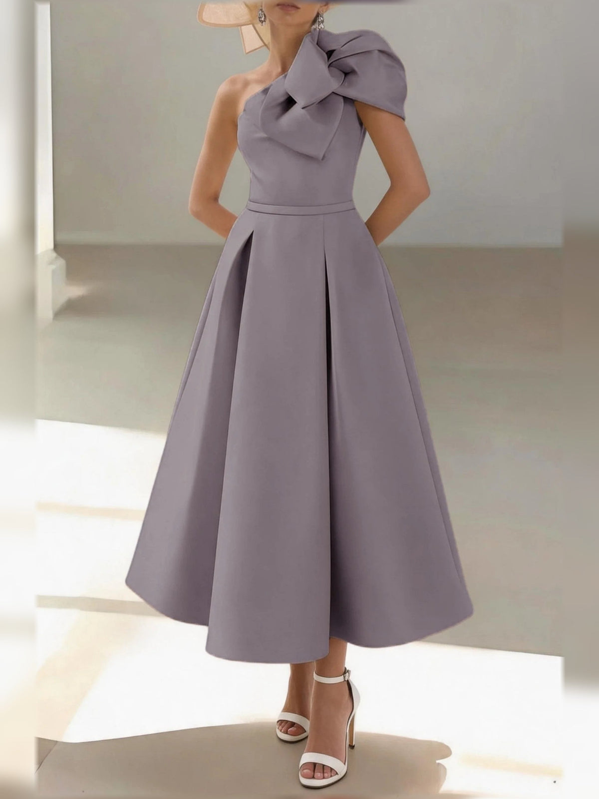 Dusty blue one-shoulder satin A-line midi dress with pleated waist and bow shoulder