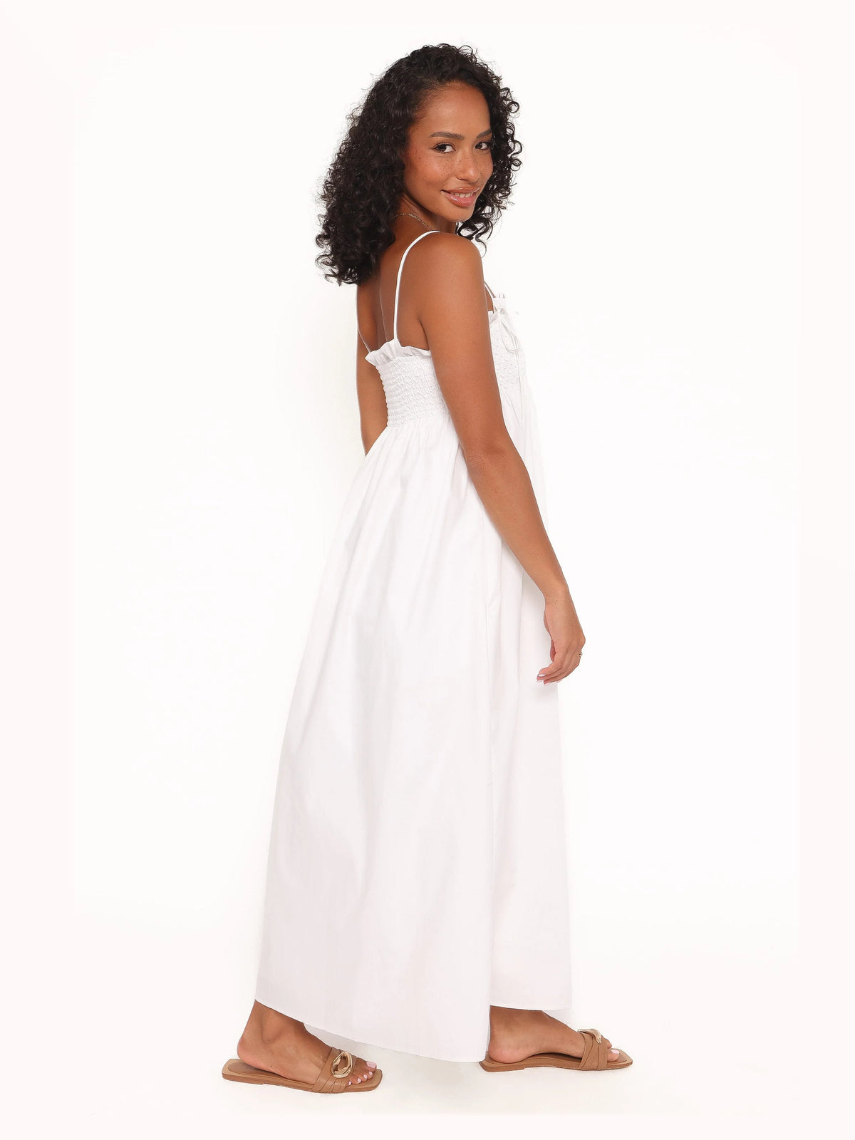 White formal dress with structured woven fabric construction and maxi hem