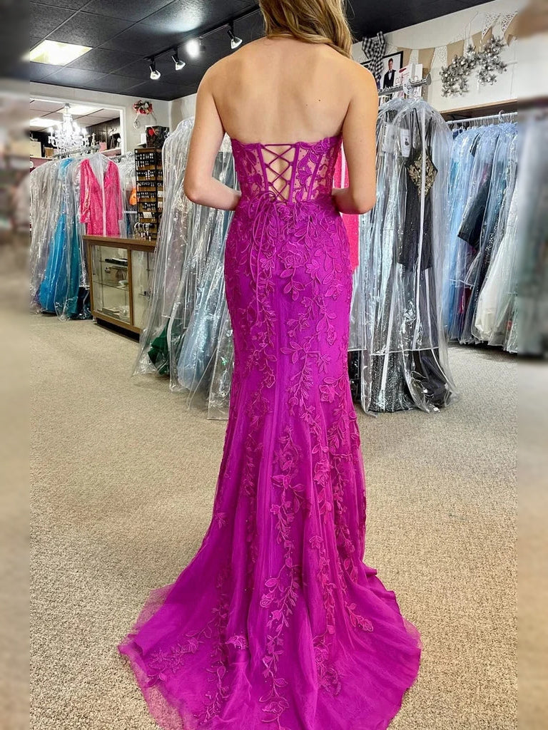 Purple corset prom dress back view with crisscross lacing and mermaid hem slit