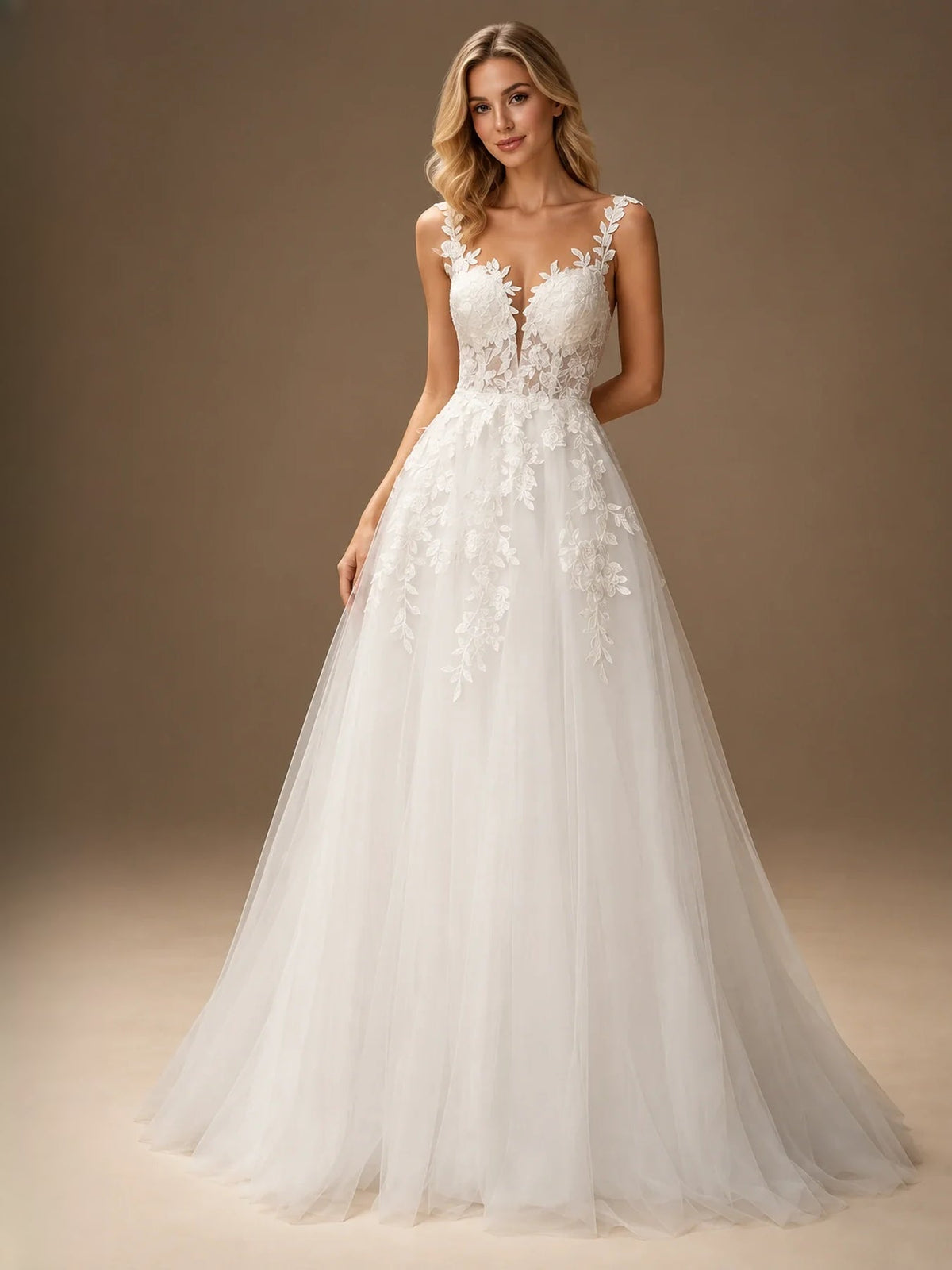 Ivory sleeveless A-line wedding dress with floral lace bodice and tulle skirt