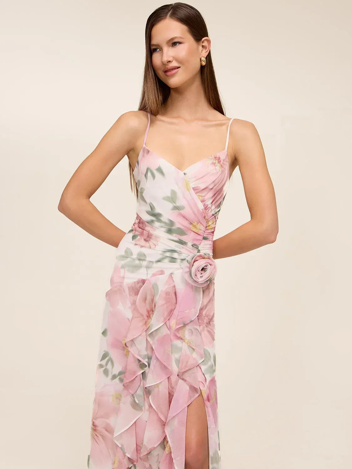Floral spaghetti-strap dress with ruffled bodice and rose accent at the waist